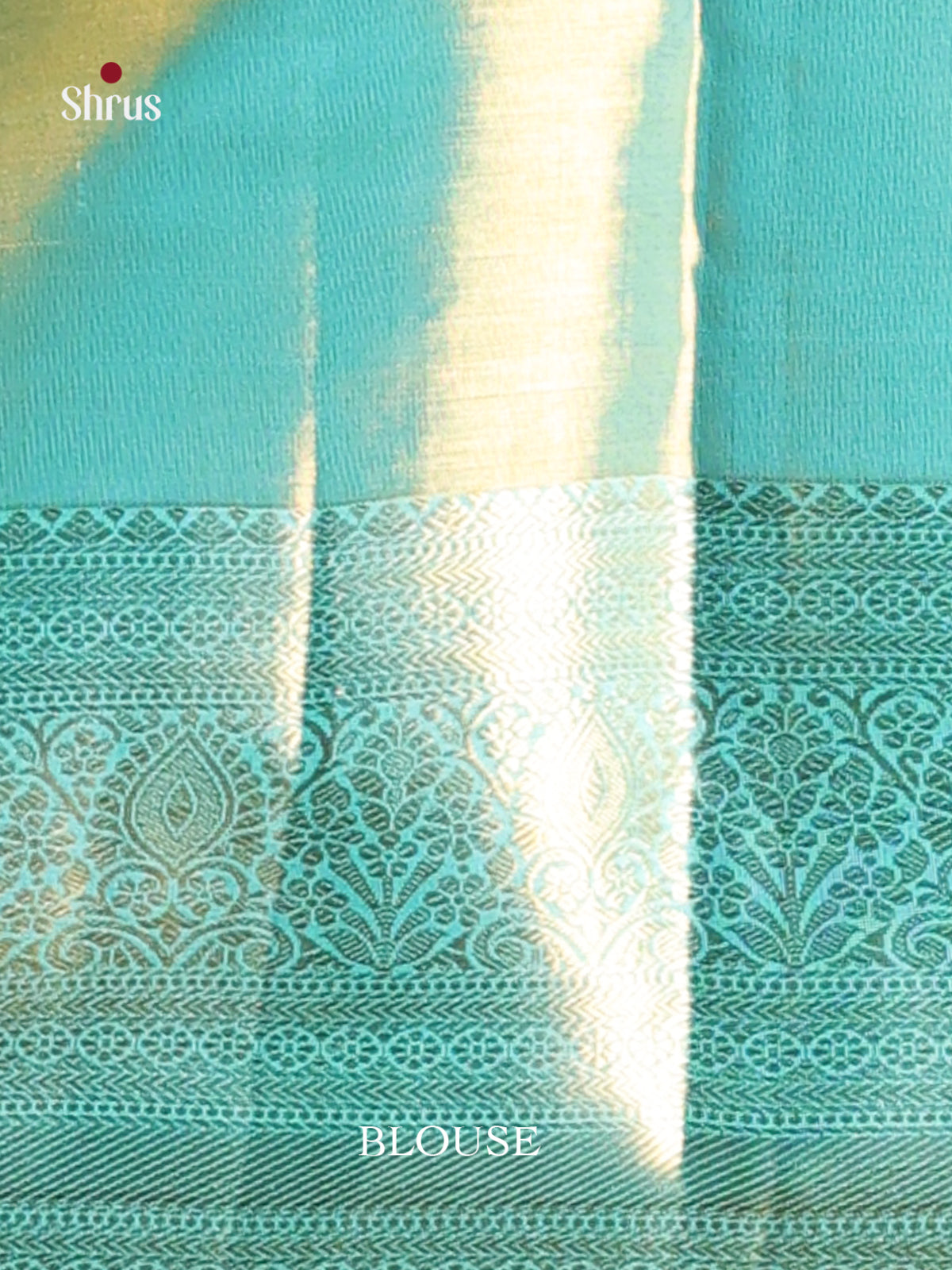 Chic Teal blue Kanjivaram silk Saree with floral nestling brocade & Zari Border