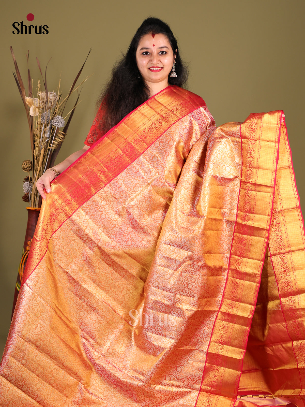 Stunning Orange Kanchipuram silk Saree with floral nestling brocade & Red Zari Border -1