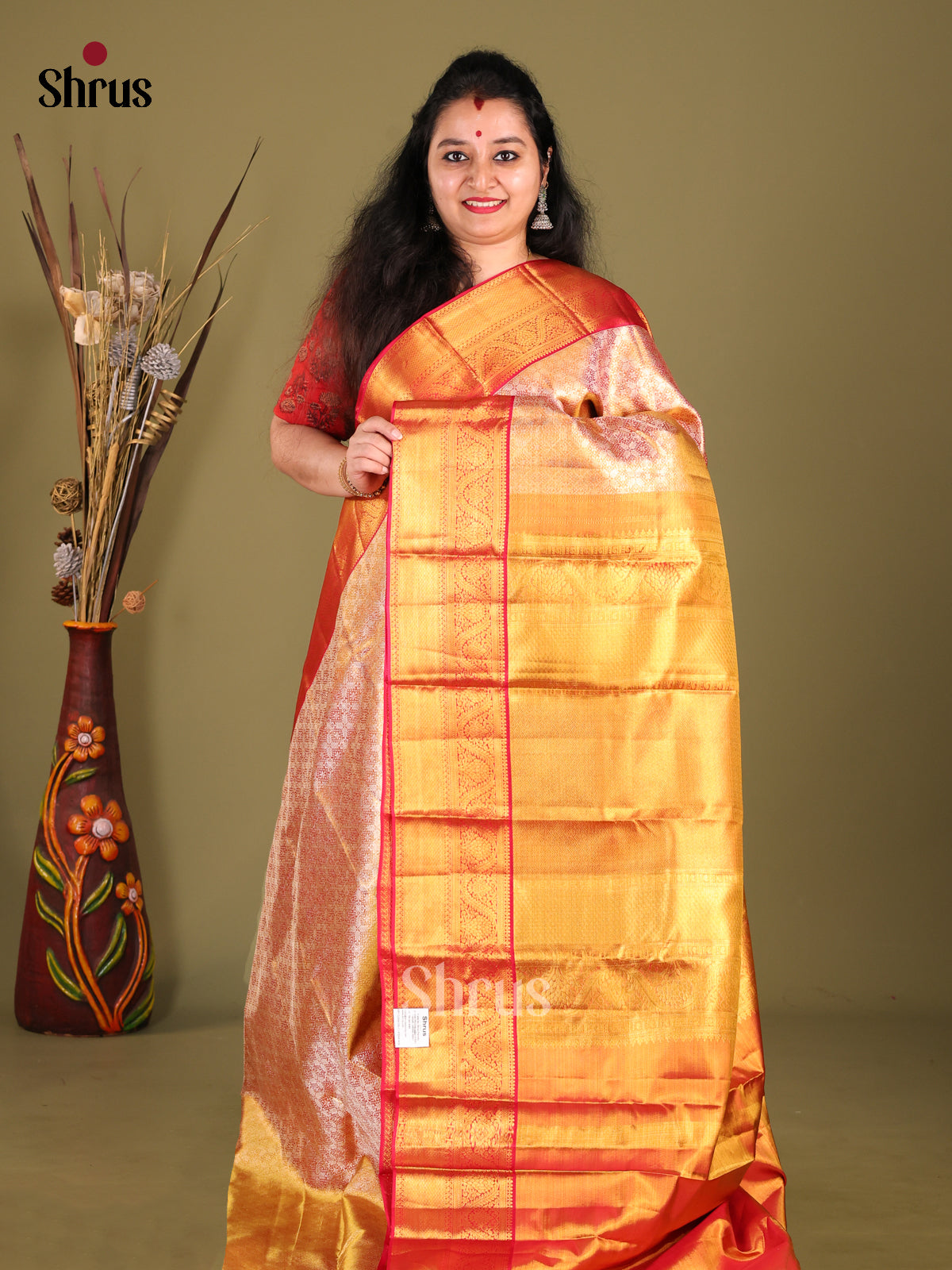 Stunning Orange Kanjivaram Saree with Red Border & Golden Zari Pallu 