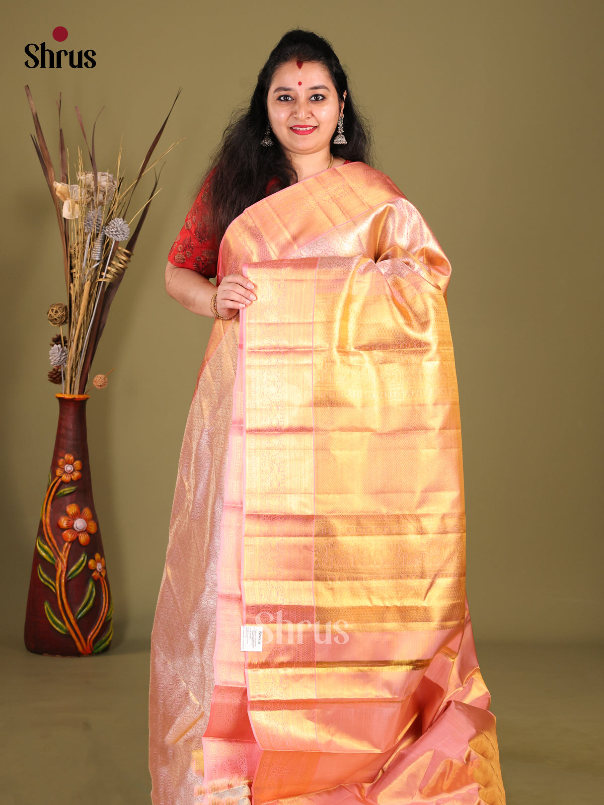 Glimmering Pink Kanjivaram Silk Saree with Nestled Zari Brocade Design