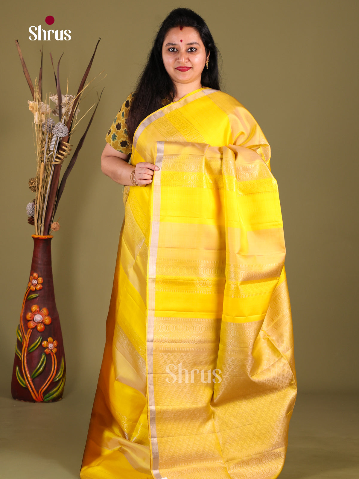 Glorious Yellow Soft Silk Saree with zari stripes & Beige Brocade pallu - Shop on Shrus.com