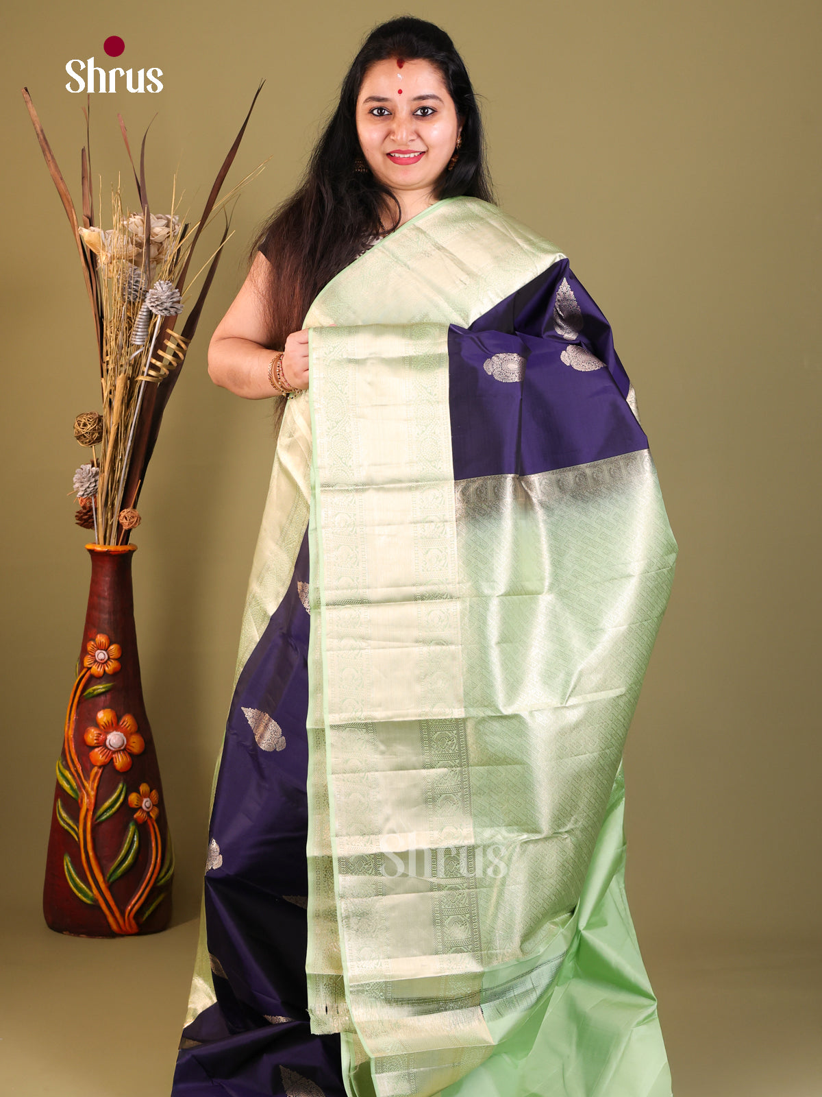 blue light green Kanchipuram Butta design Saree