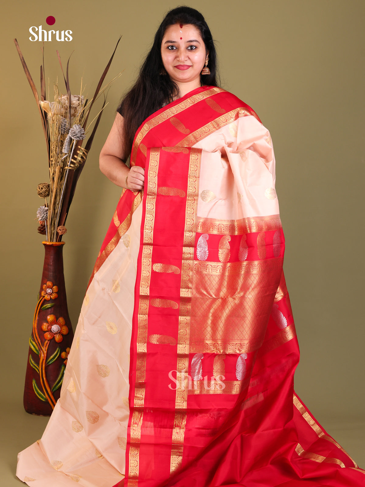 Peach and red Kanchipuram Butta design Saree