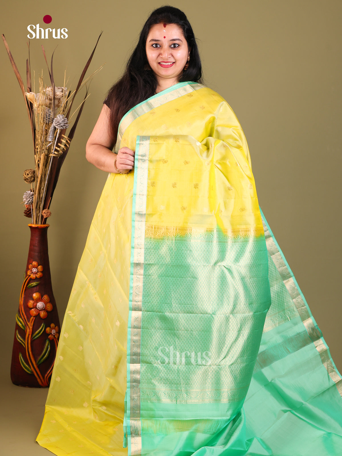 yellow and green Kanchipuram Butta design Saree