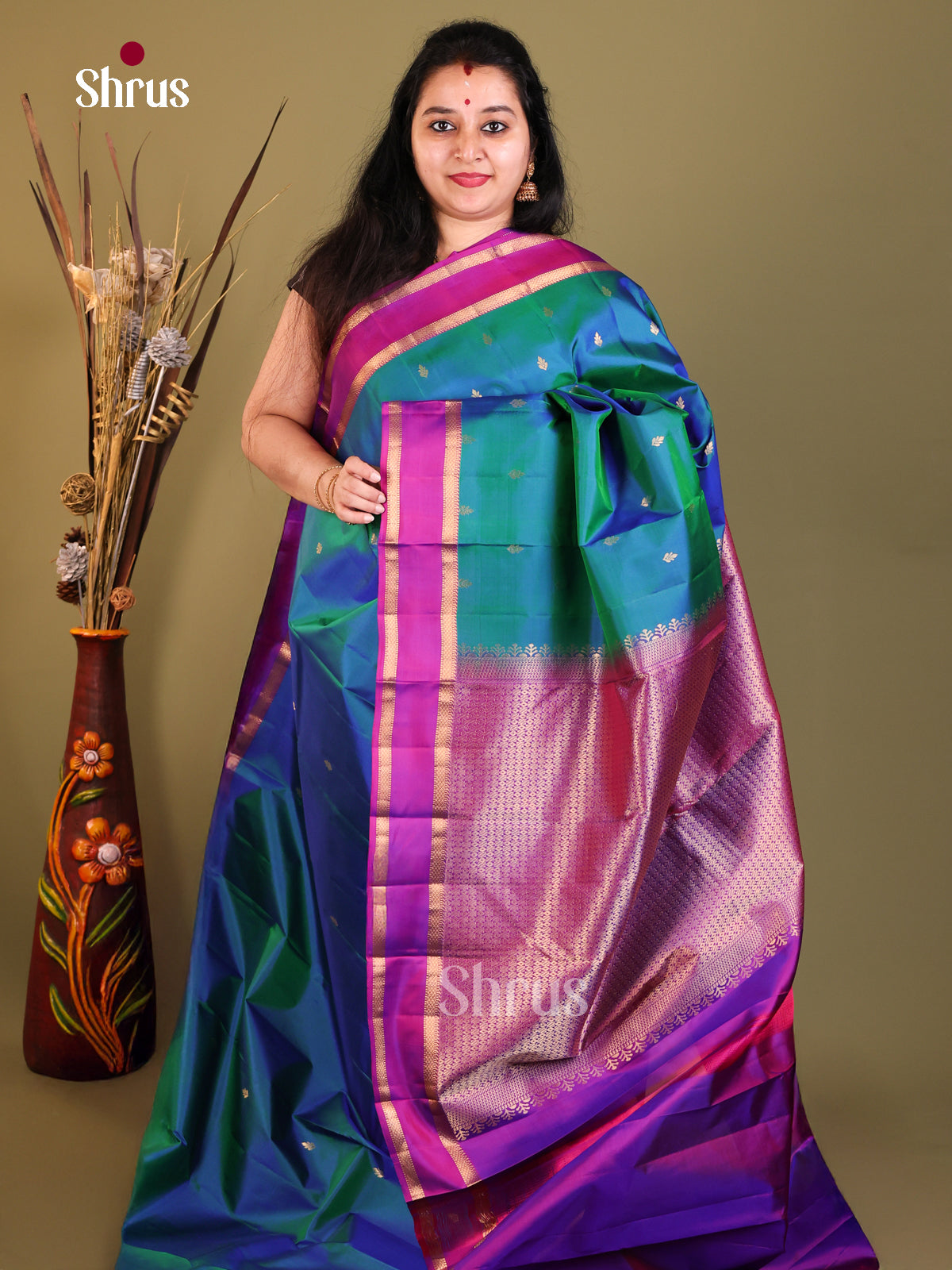 Peacoke blue and purple Kanchipuram Butta design Saree