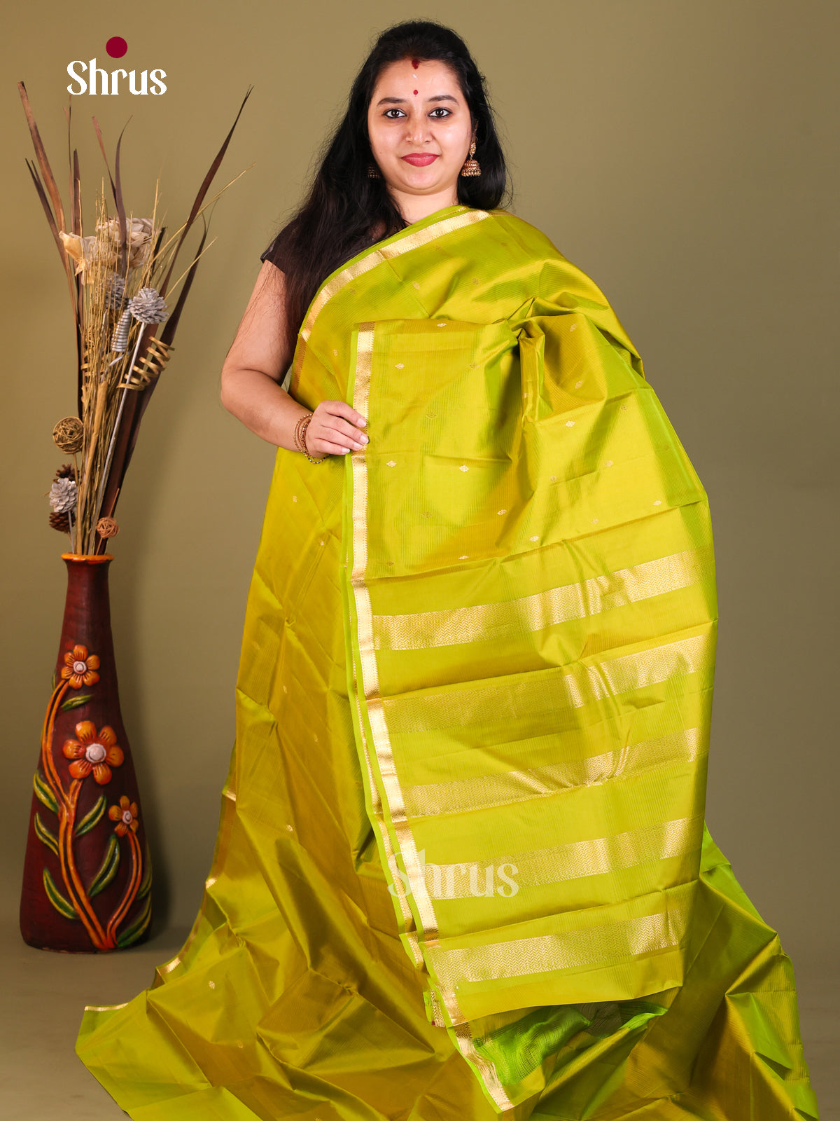 murstatrd yellow Kanchipuram Butta design Saree
