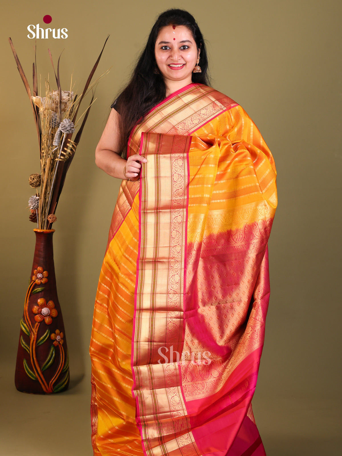 Orange and red Kanchipuram Butta design Saree 