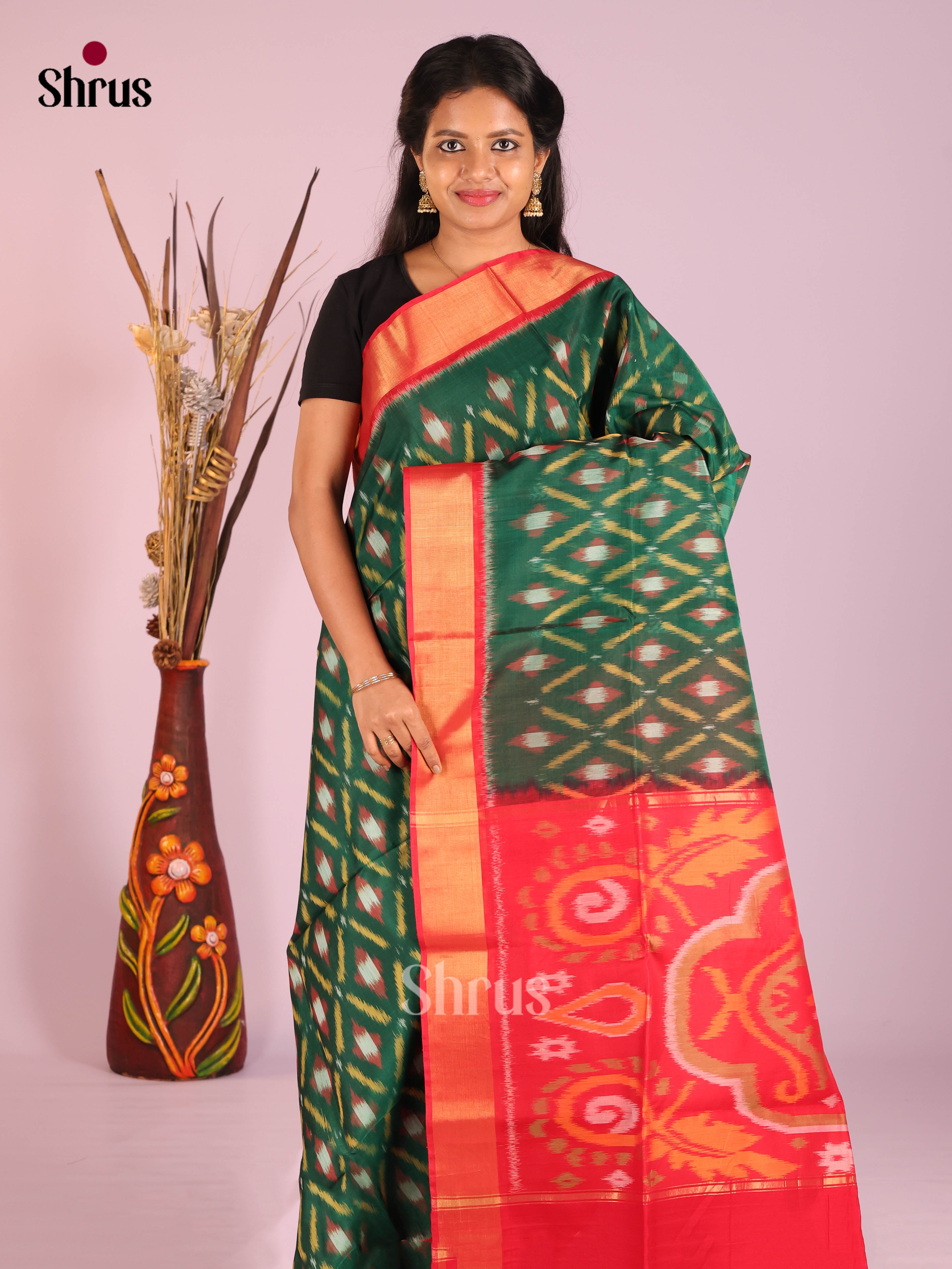Striking Deep Green Pochampally Silk Cotton Saree with Red Ikat Pallu