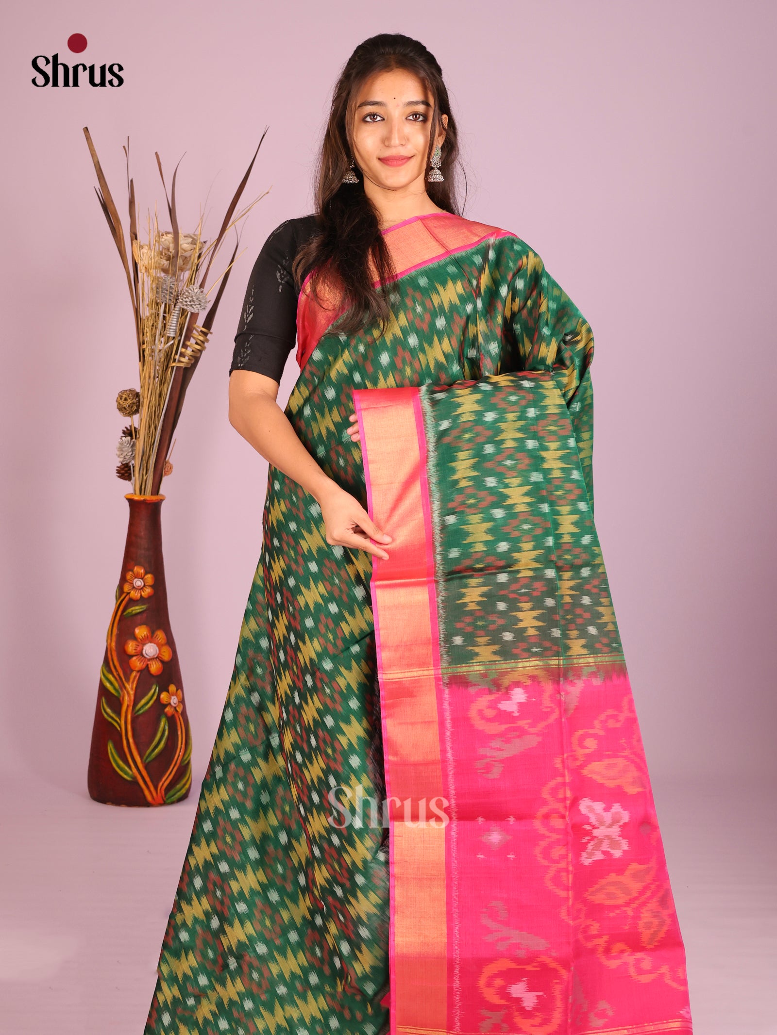 Serene Green Silk Cotton Saree With Pochampally Weave & fuchsia Pink Zari Border