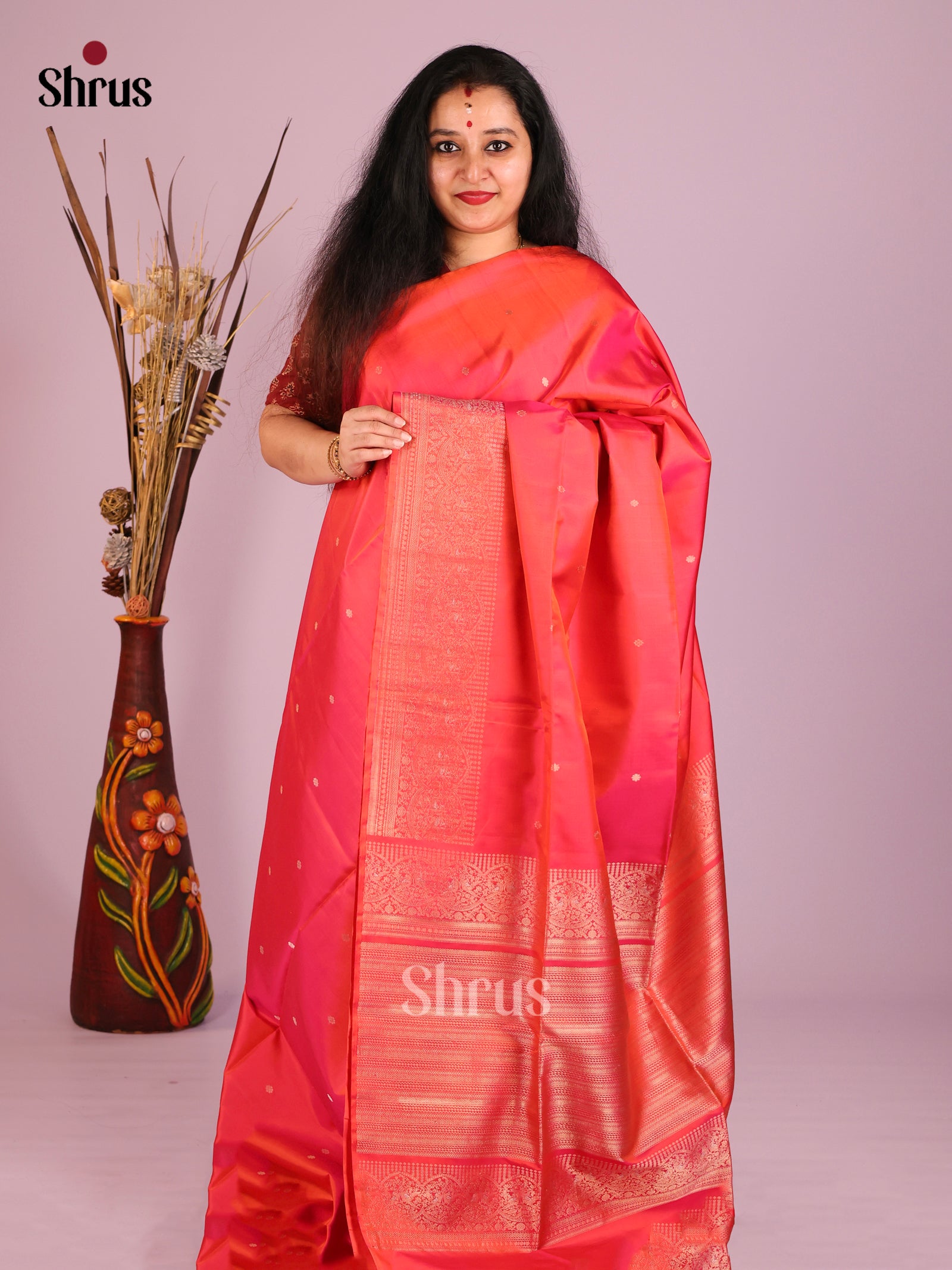 Luminous Coral Pink Soft Silk Saree With Gold Buttas & Peacock Zari Woven Border