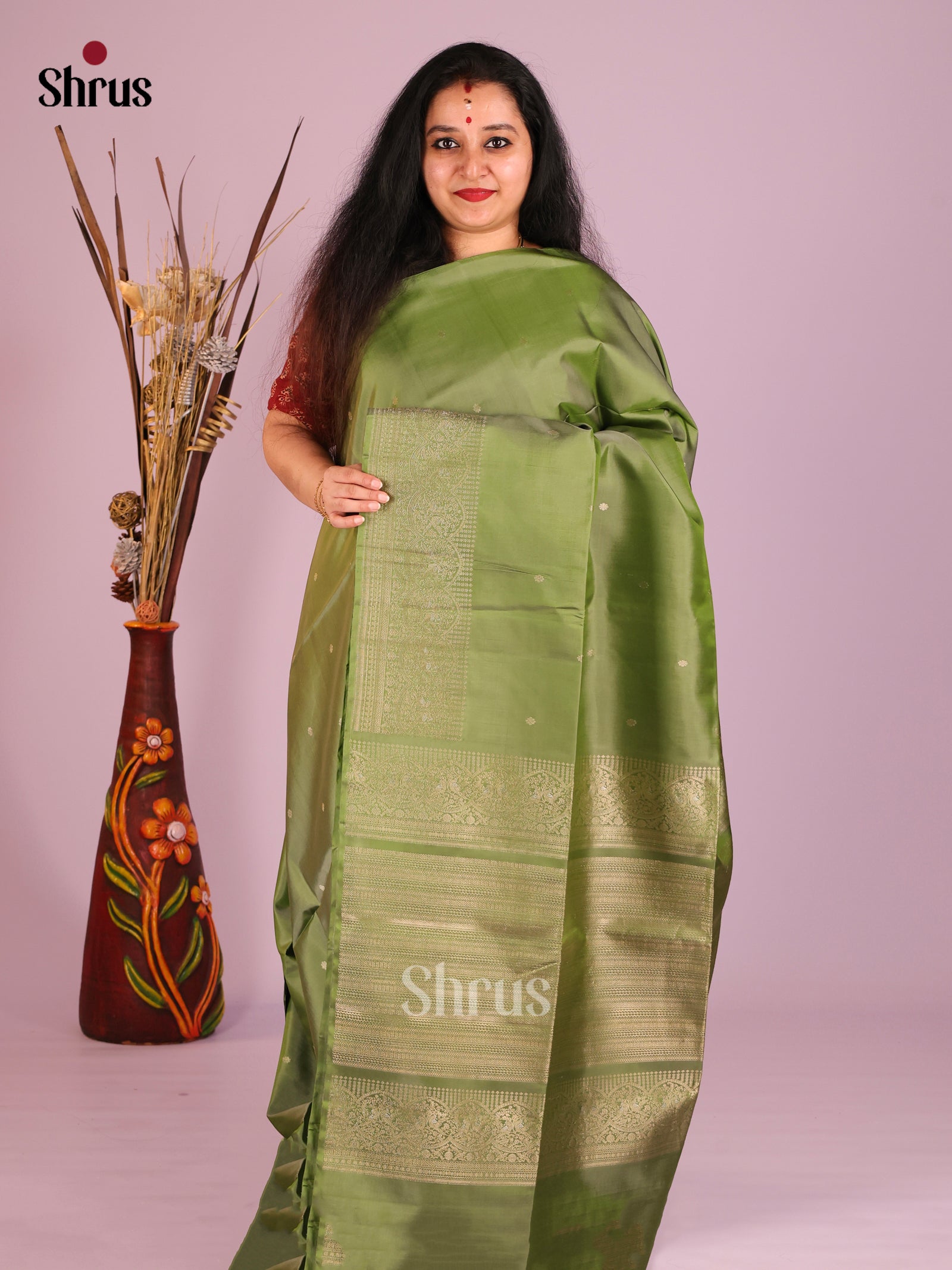 Timeless Olive Green Soft Silk Saree with Small Gold buttas & Peacock Zari Border