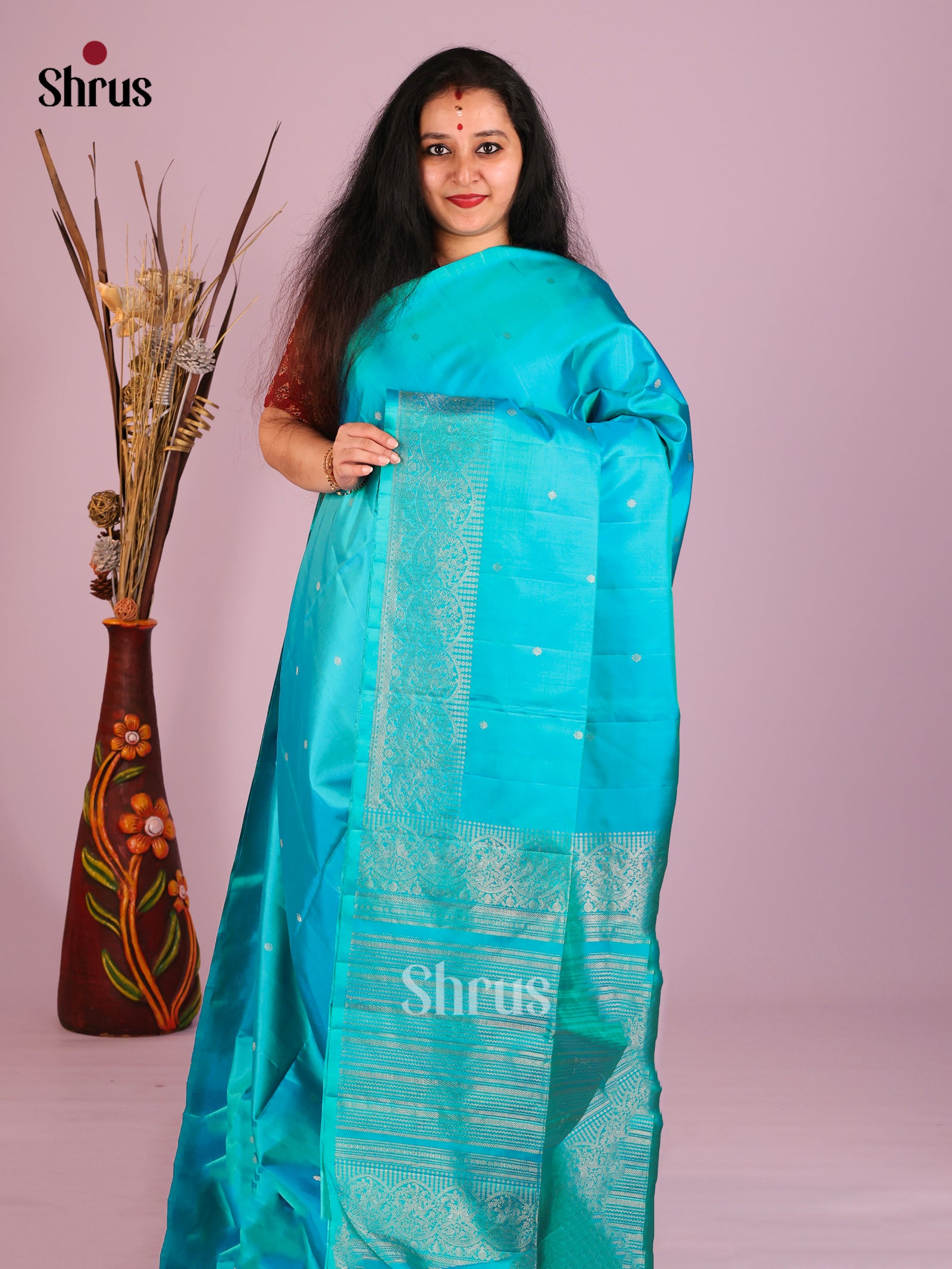 Breezy Light Blue Soft Silk Saree With Gold Buttas & zari Woven Peacock border