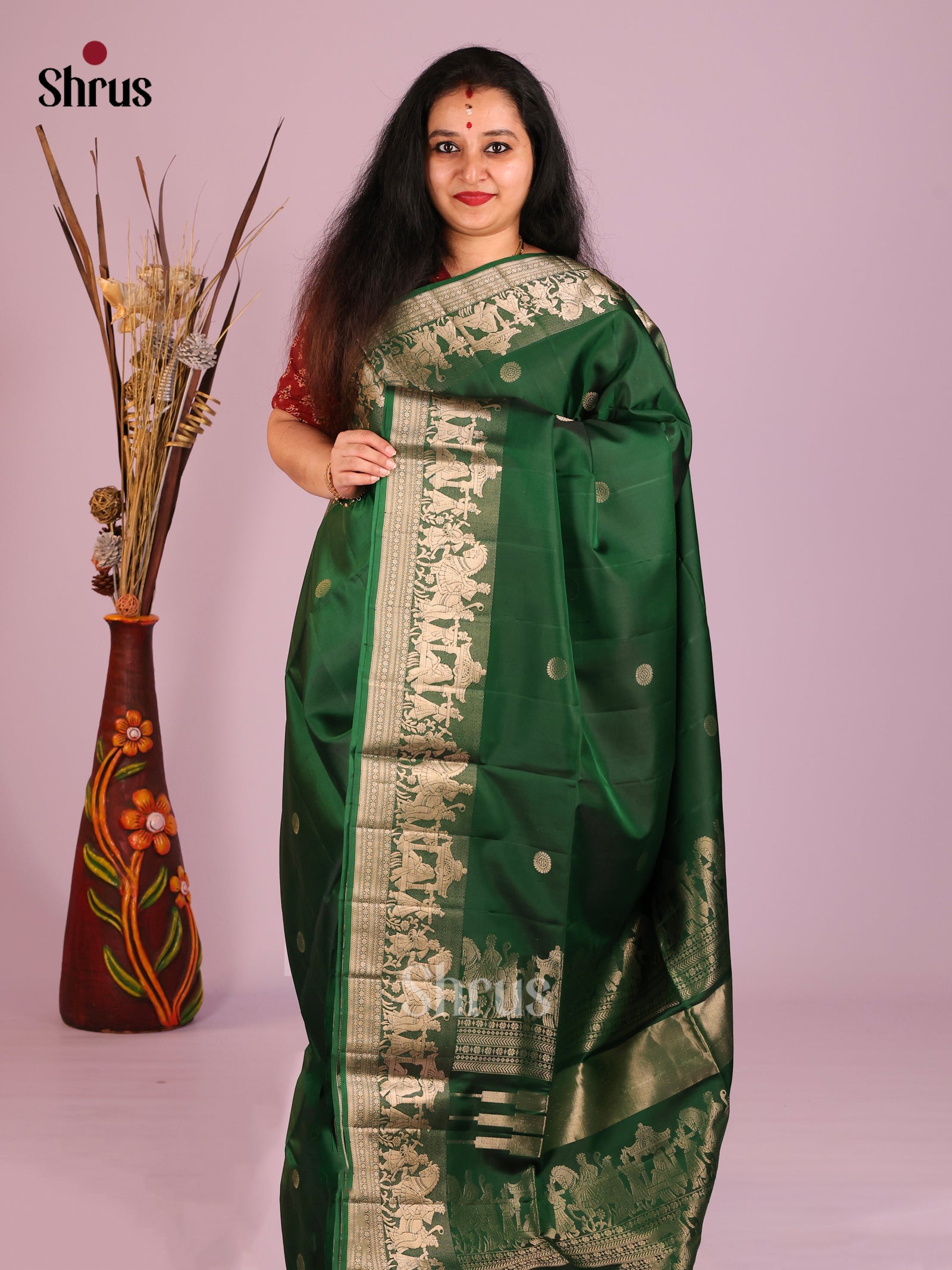 Classy Dark Green Soft Silk Saree with Rudraksh Buttas & baraat themed border & pallu 
