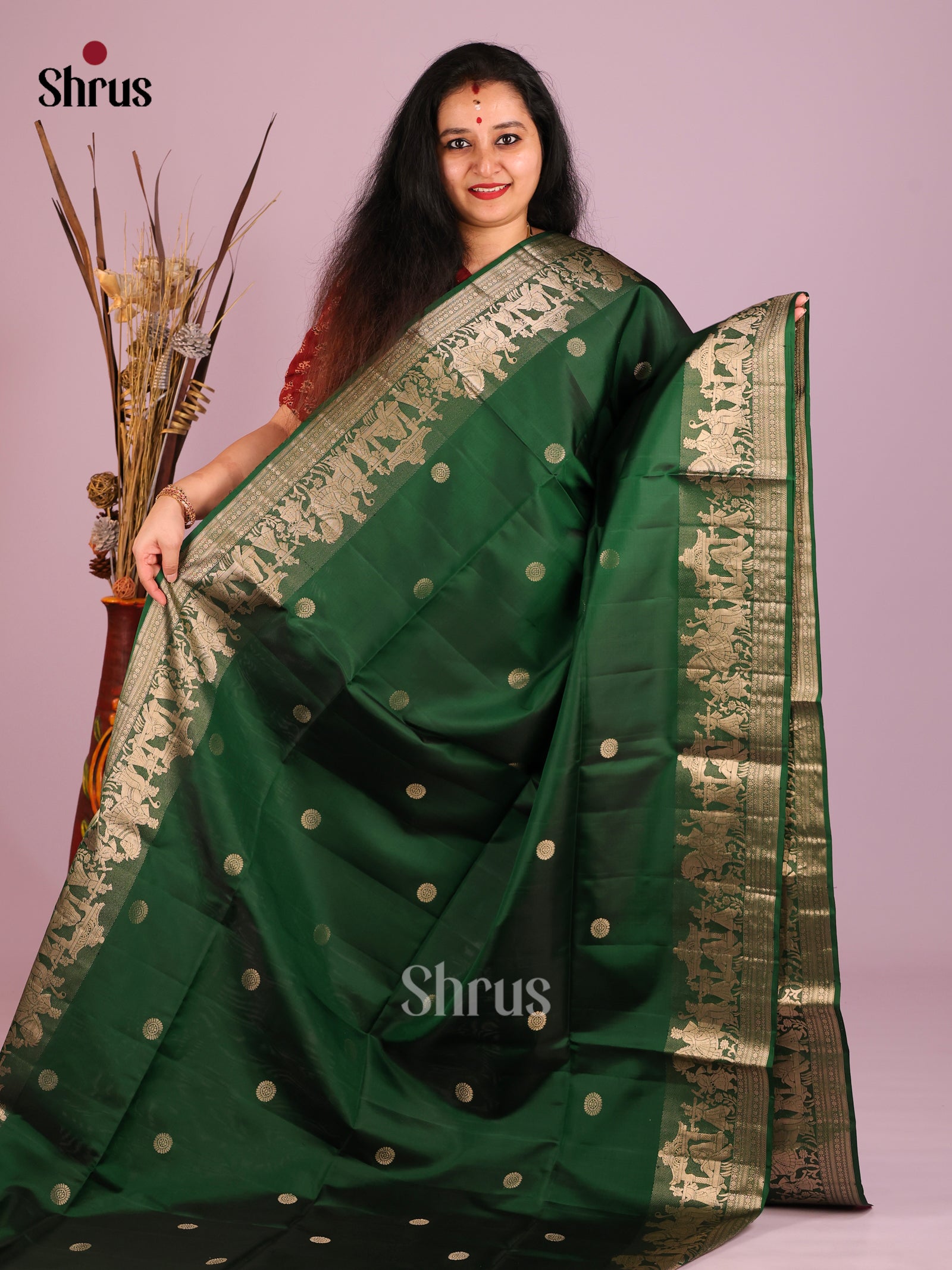 Classy Dark Green Soft Silk Saree with Rudraksh Buttas & baraat themed border & pallu 1