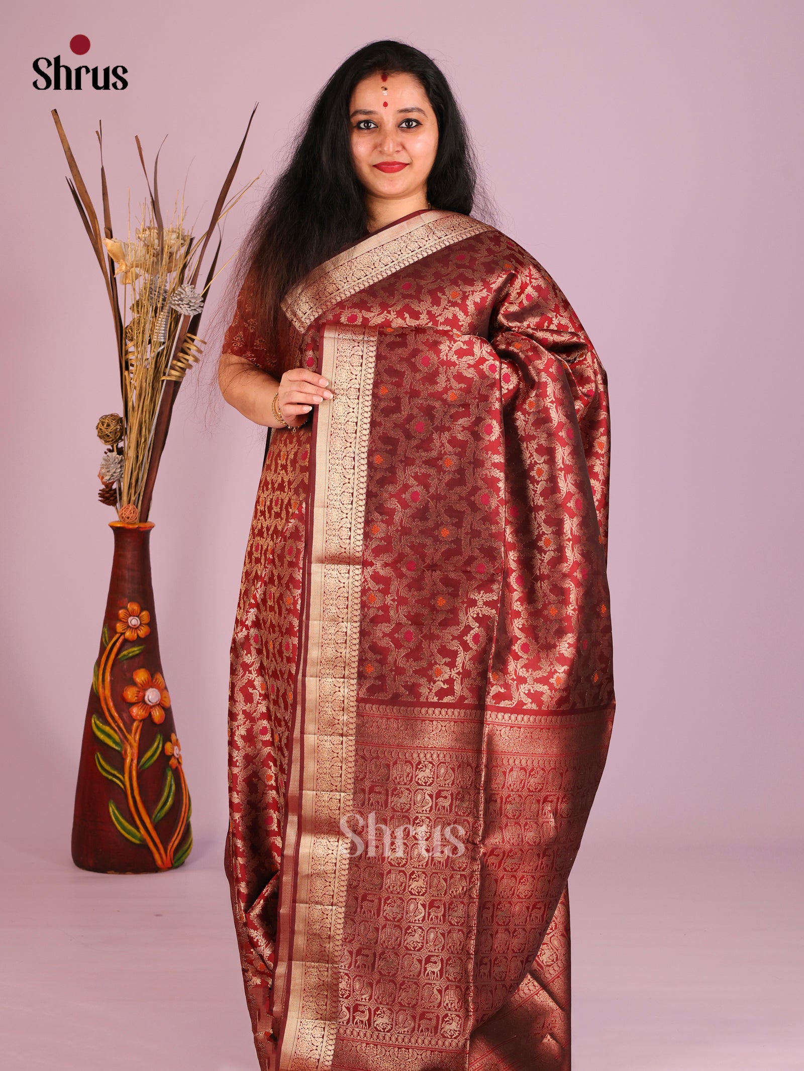 Striking Maroon Soft Silk Saree with zari floral nestling brocade & zari border