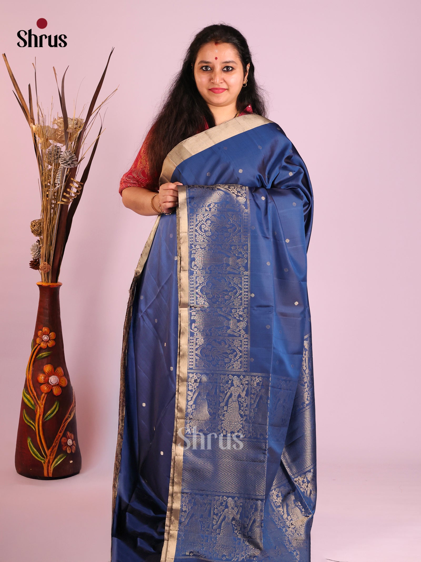 Vibrant Dark Blue Soft Silk Saree with gold buttas & zari doll motifs in the border 