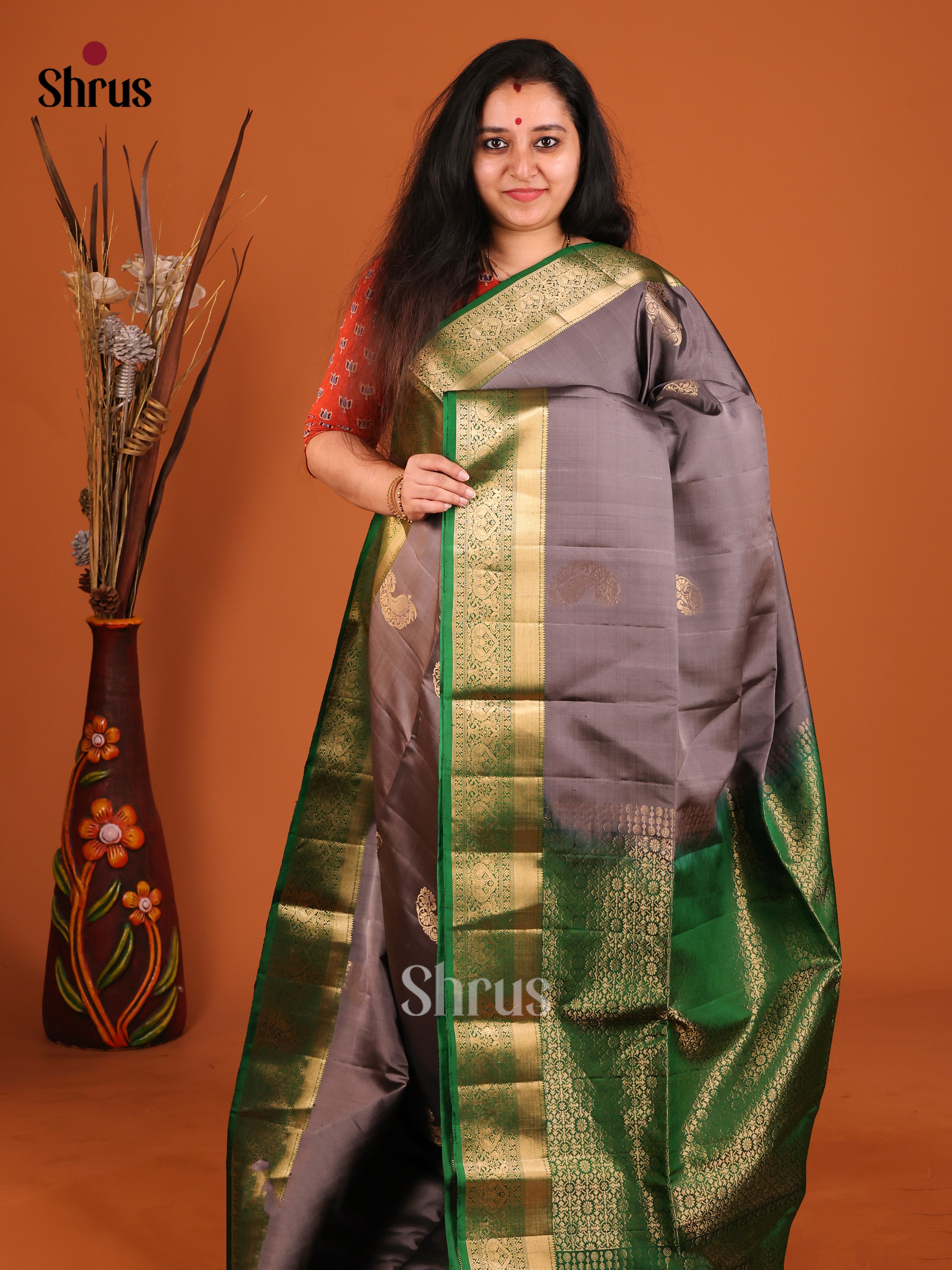 Elegant Grey Soft Silk Saree with gold Manga Motifs & Green Brocade Pallu