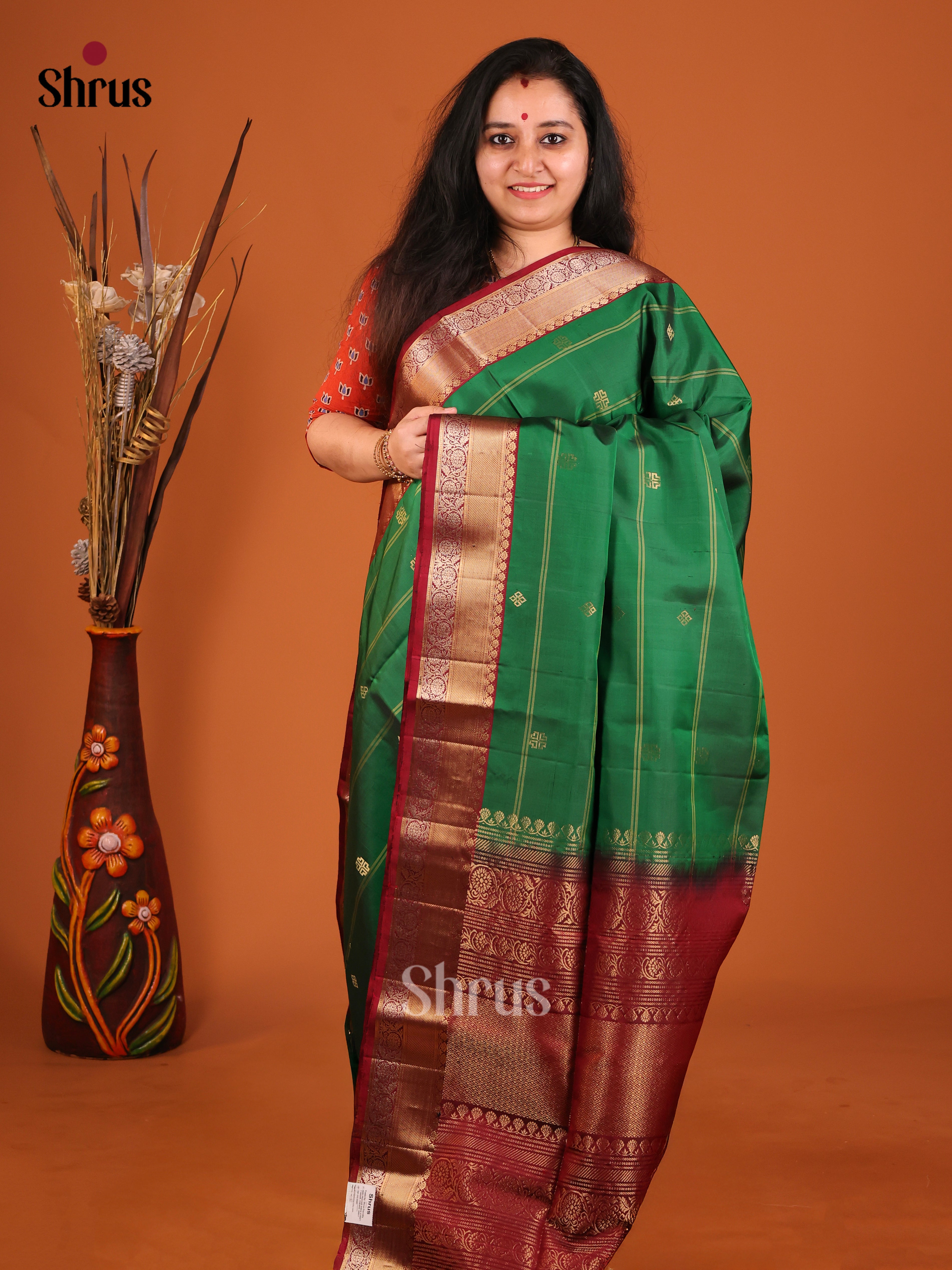 Majestic Green Soft Silk Saree with stripes, gold buttas & Maroon Brocade Pallu