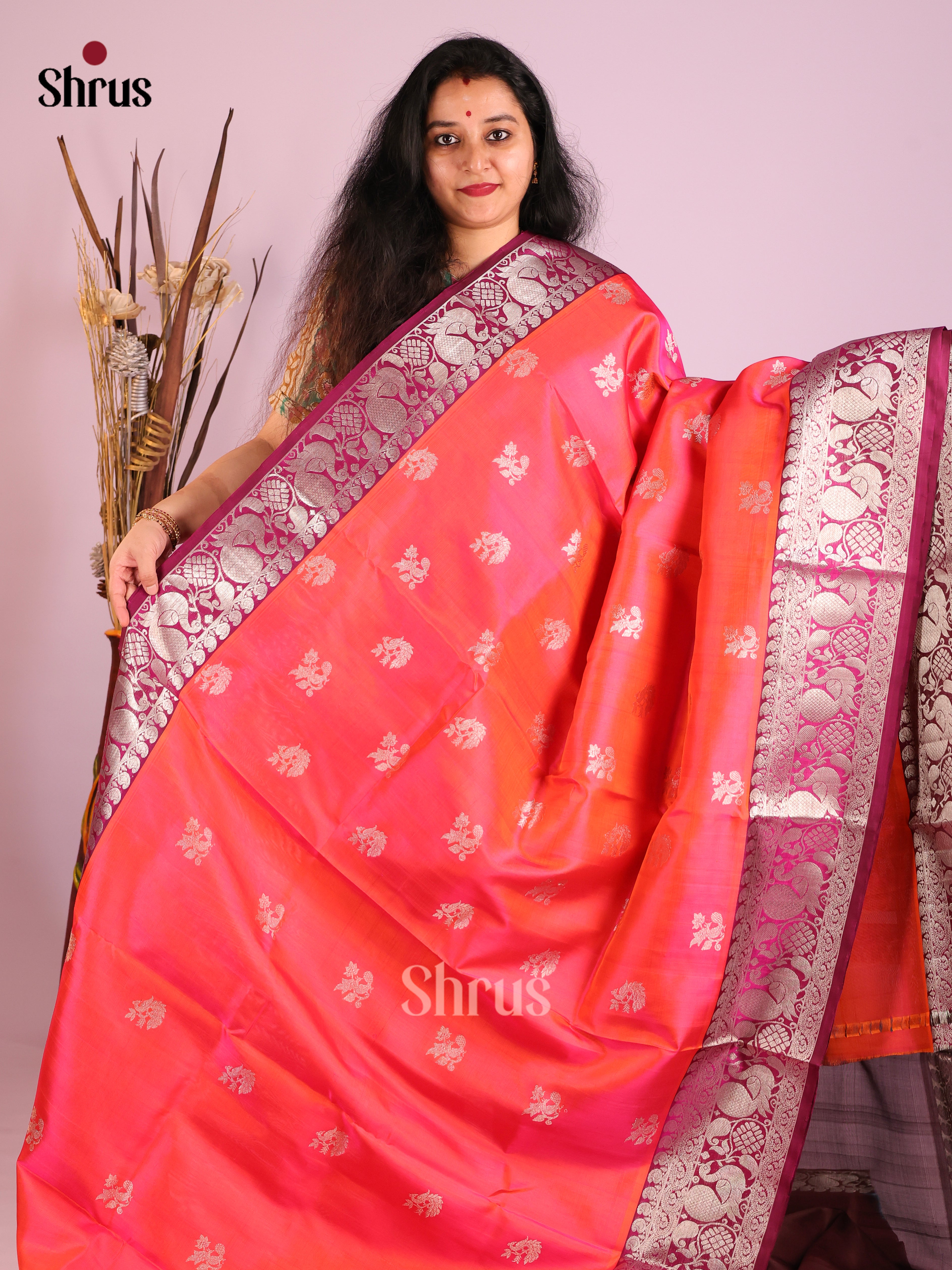 Radiant Orangish Pink Venkatagiri silk Saree adorned with rich zari peacock motifs border - Shop on Shrus.com
