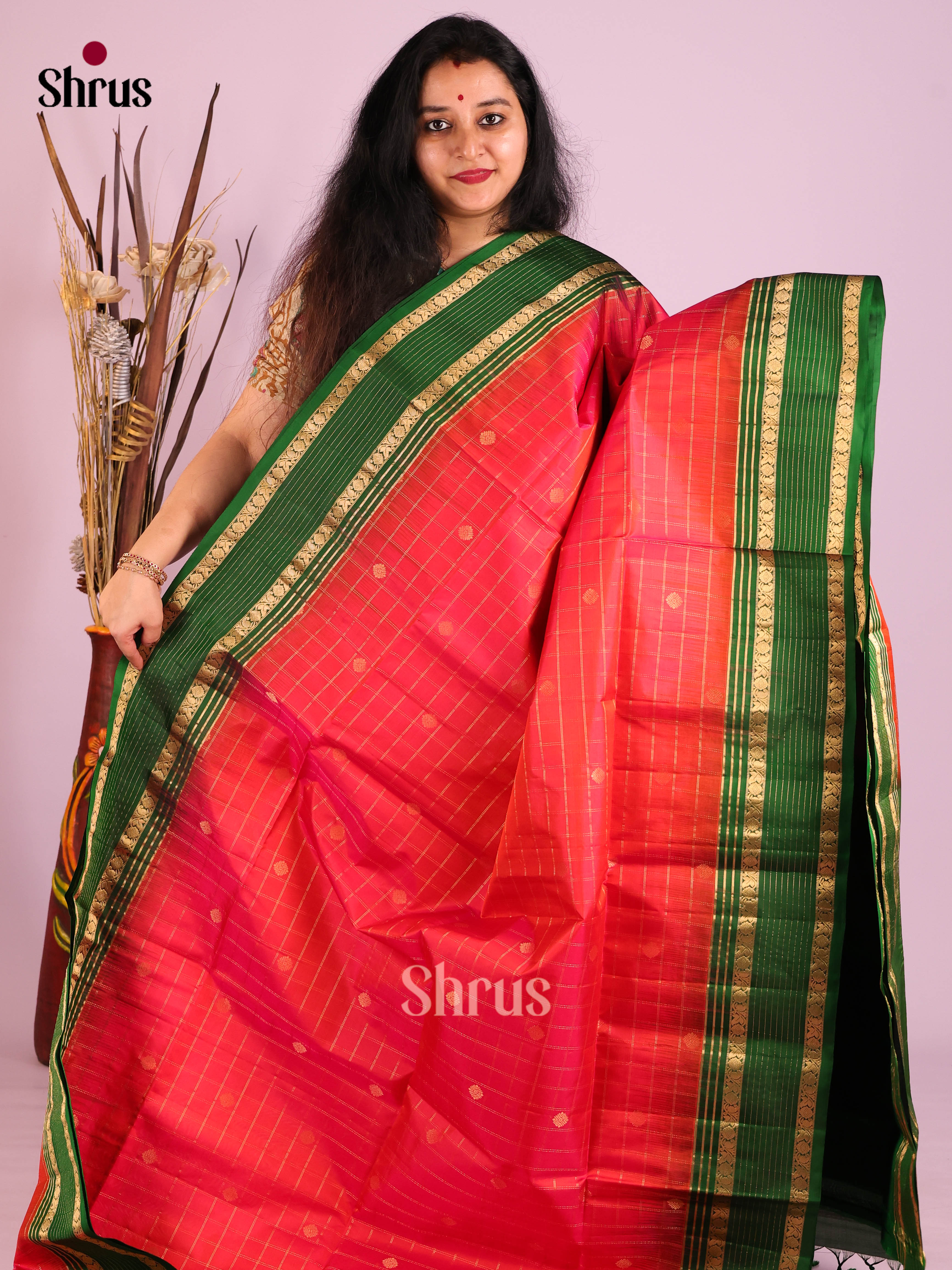 Radiant Orangish pink Soft Silk Saree with zari checks, buttas & Green Rettaipet Border 1