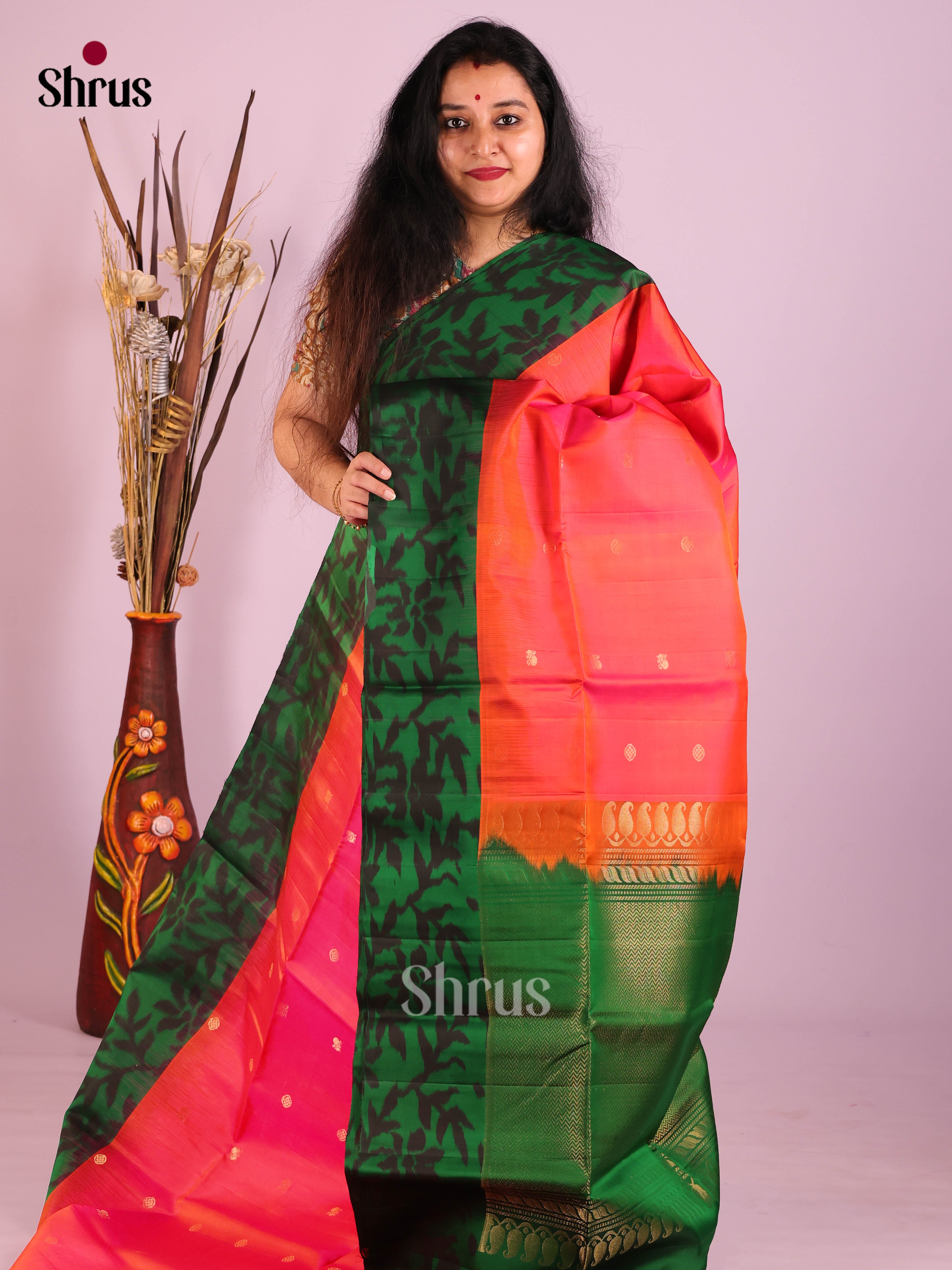 Dazzling Orangish Pink Soft Silk Saree with Buttas & Green ikkat pochampally floral border
