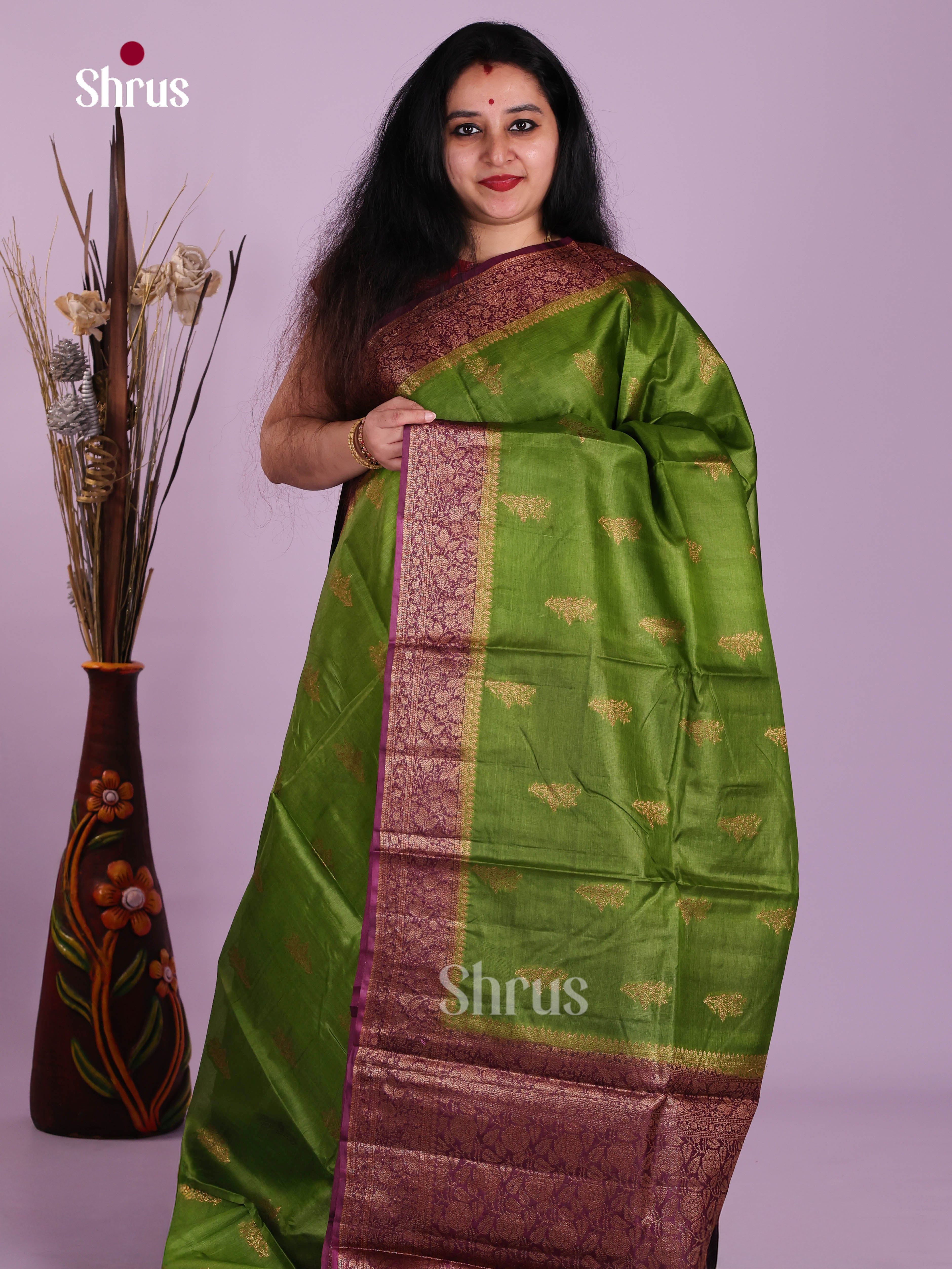 Serene Light Green Handloom Tussar Silk Saree With Golden Motifs & Purple Border