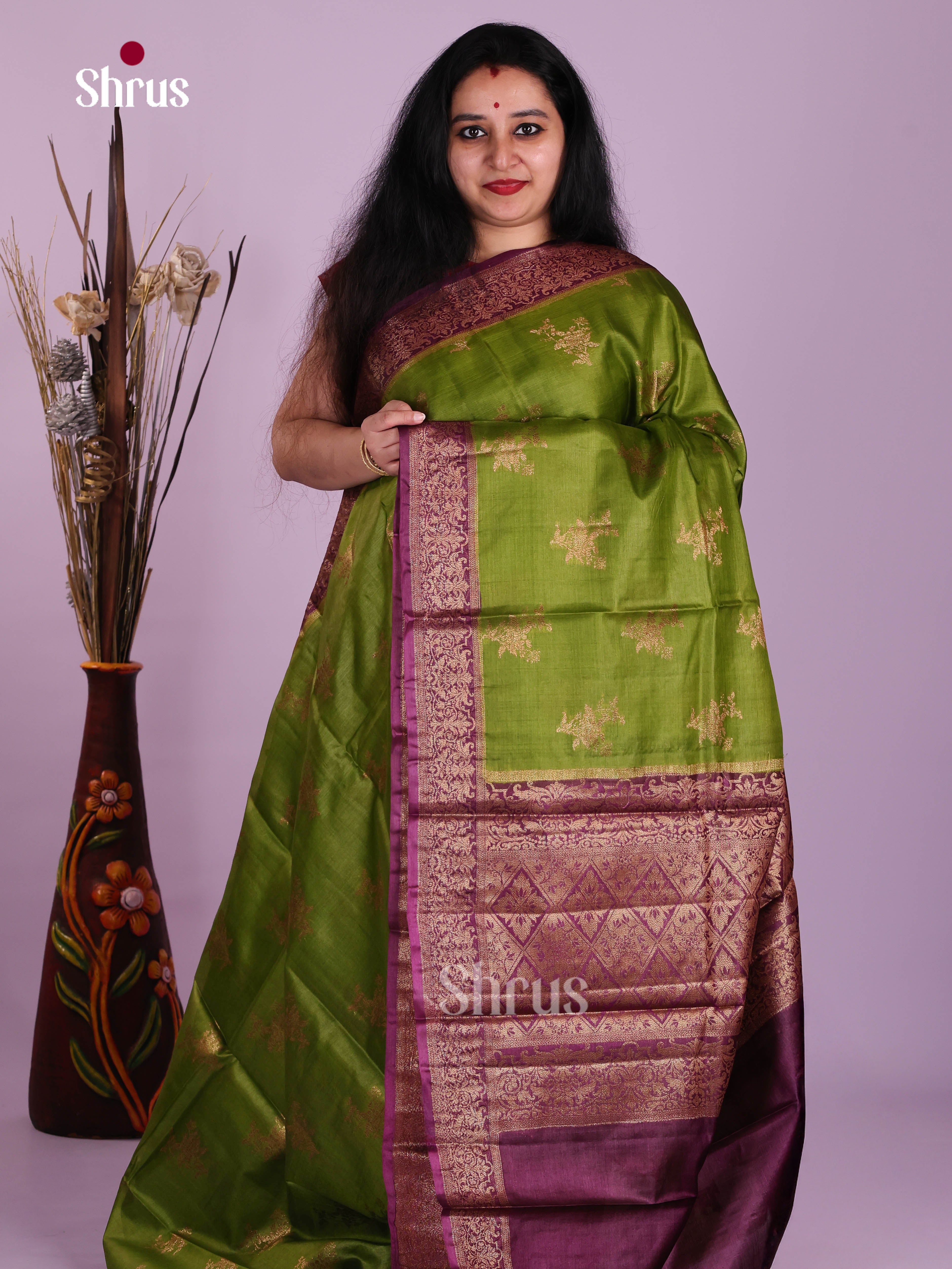 Vibrant Green Handloom Tussar Silk Saree With Golden Motifs & Purple Pallu