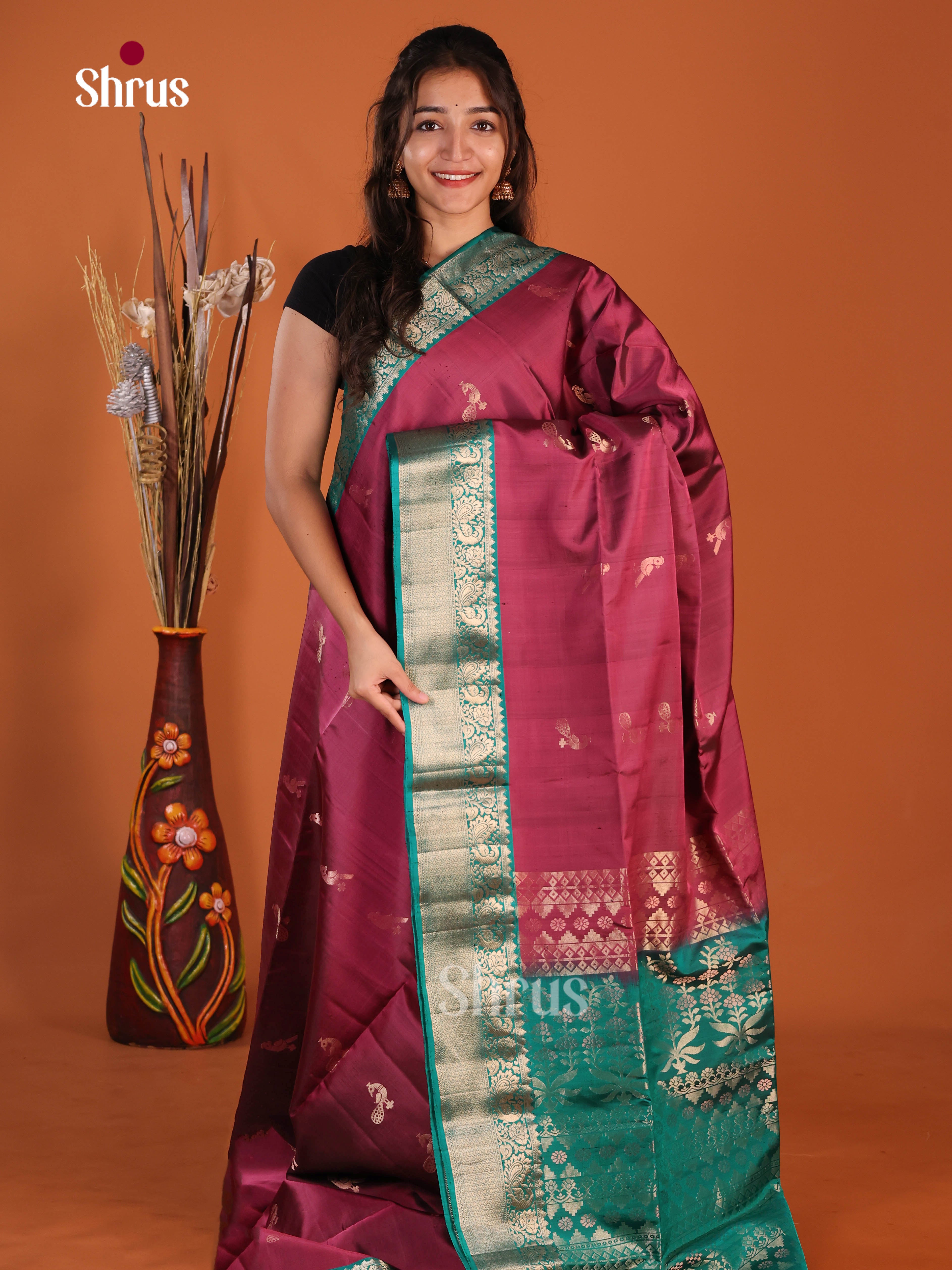 Graceful Maroon & Green Soft Silk Saree glemas with zari peacock buttas, brocade pallu