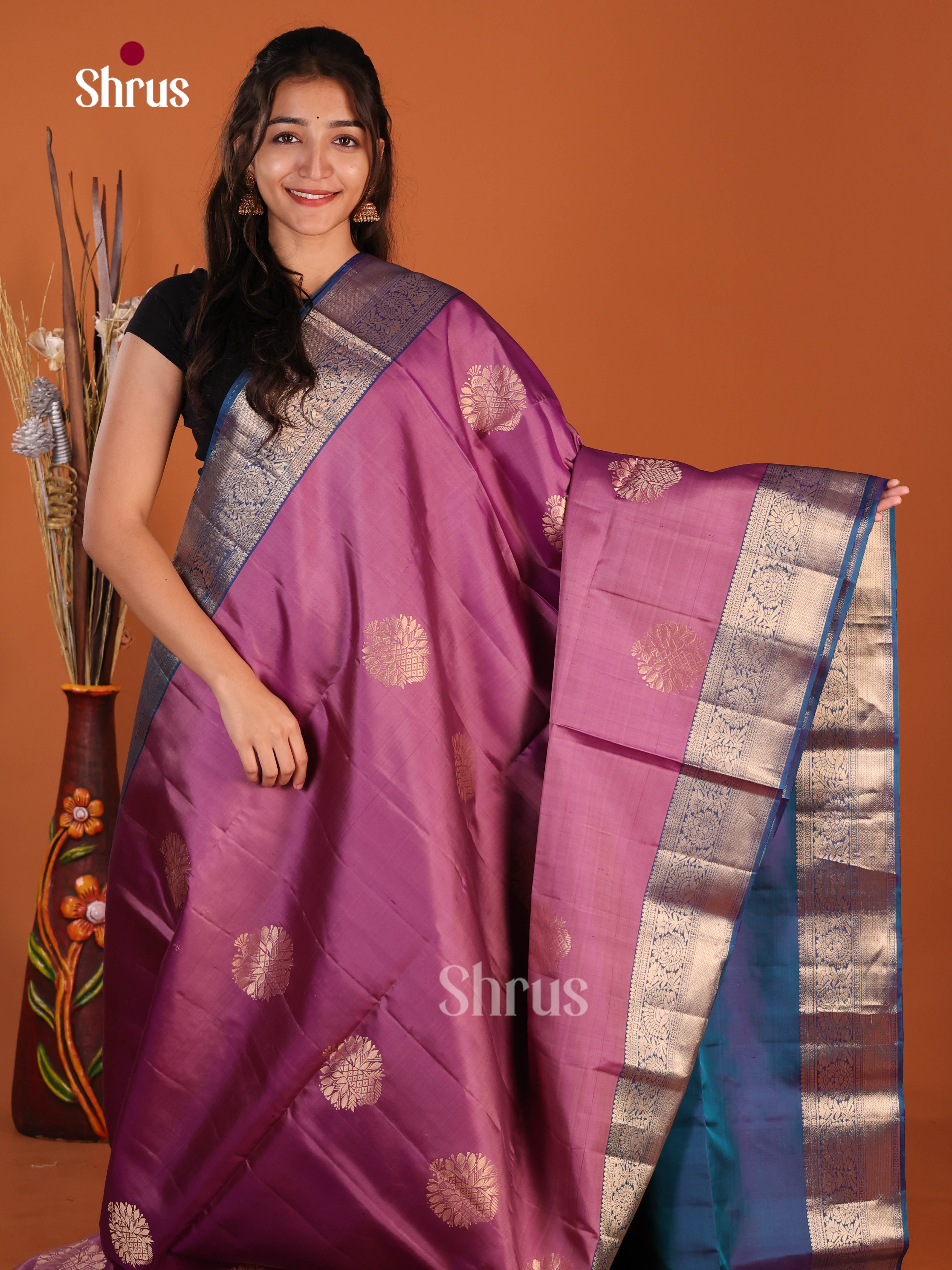 Subtle Onion Pink & Blue Soft Silk Saree gleams with zari floral motifs - Shop on Shrus.com