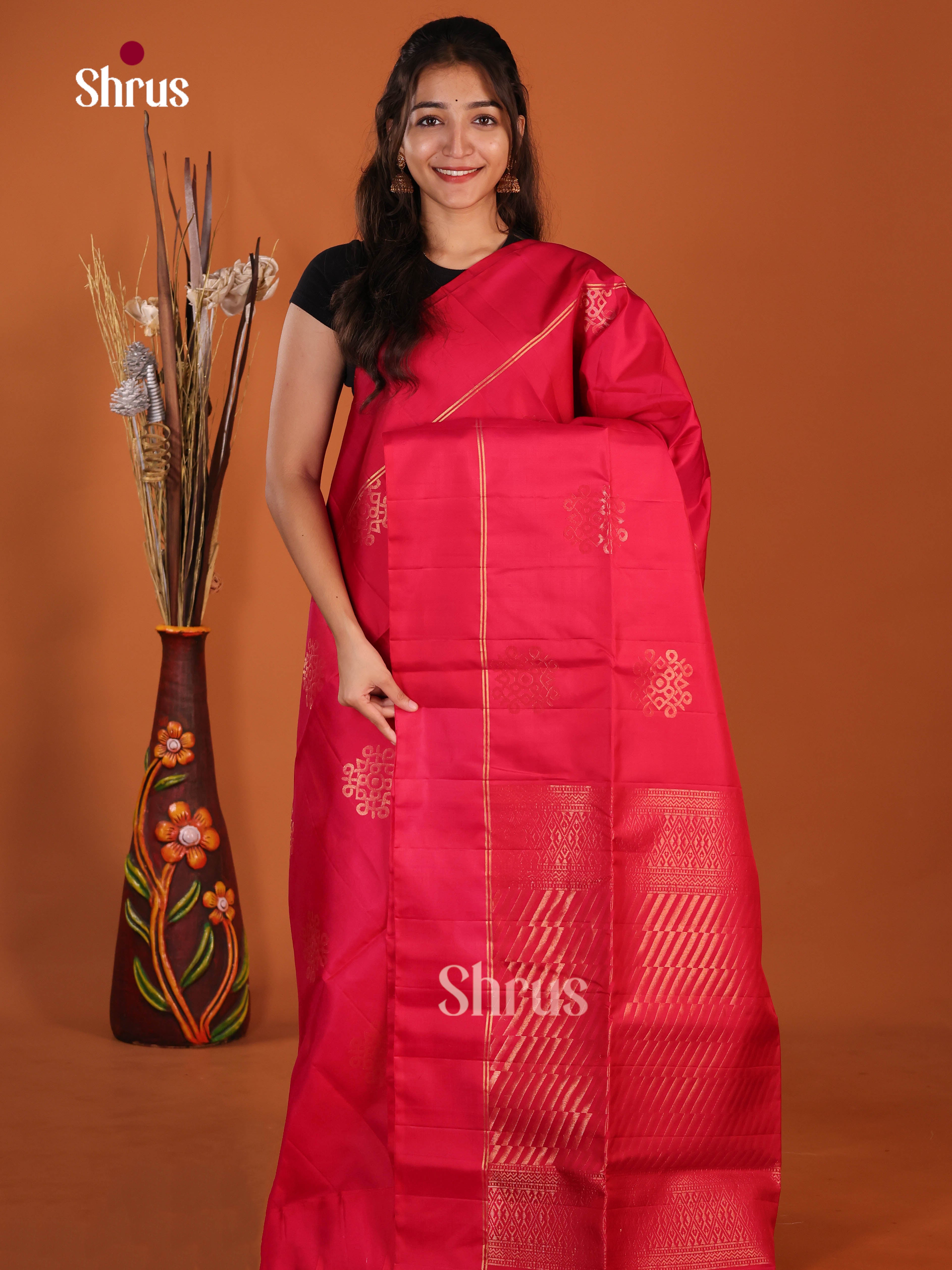 Magnificient Red Soft Silk  Saree gleams with gold zari kolam motifs, brocade pallu