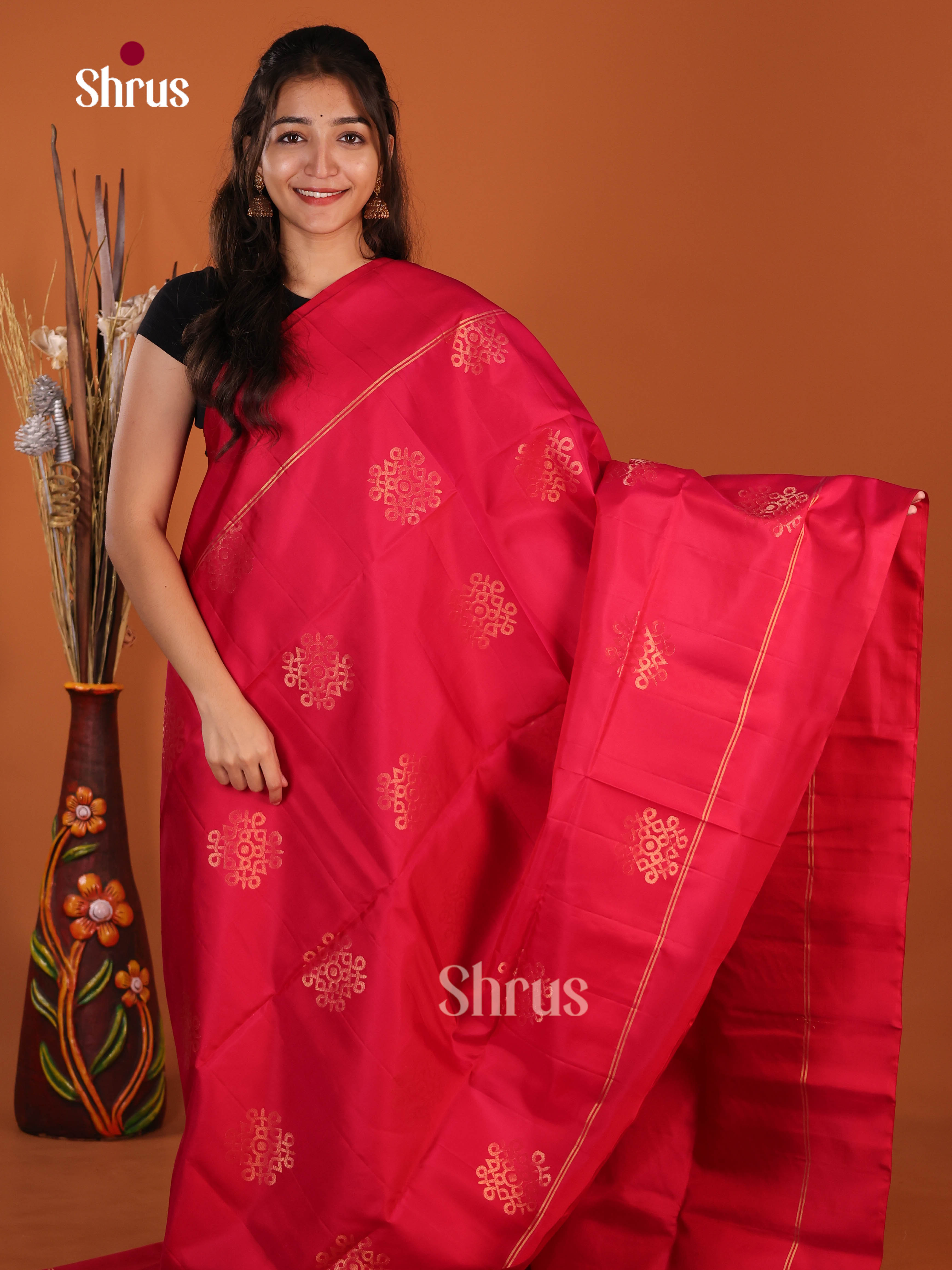 Magnificient Red Soft Silk  Saree gleams with gold zari kolam motifs, brocade pallu