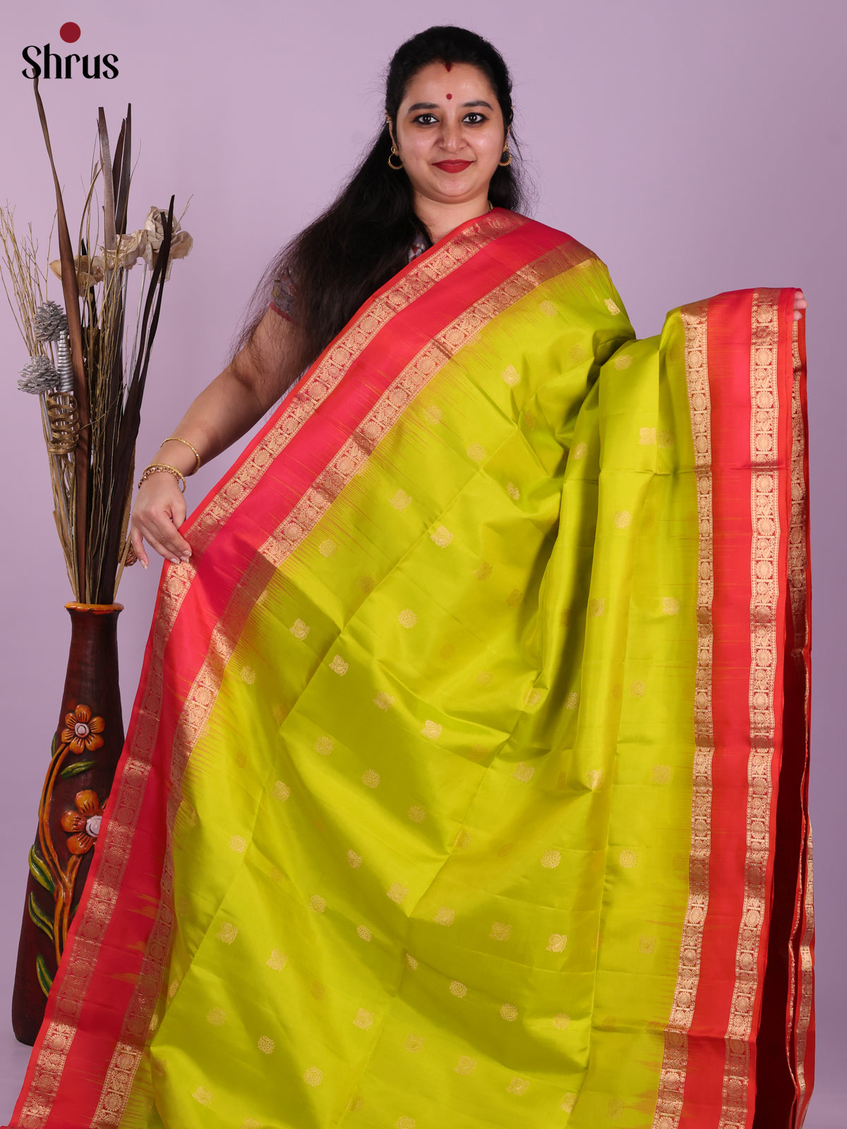 Ethereal Lime Green Soft Silk Saree with gold zari peacock buttas , rettaipet border