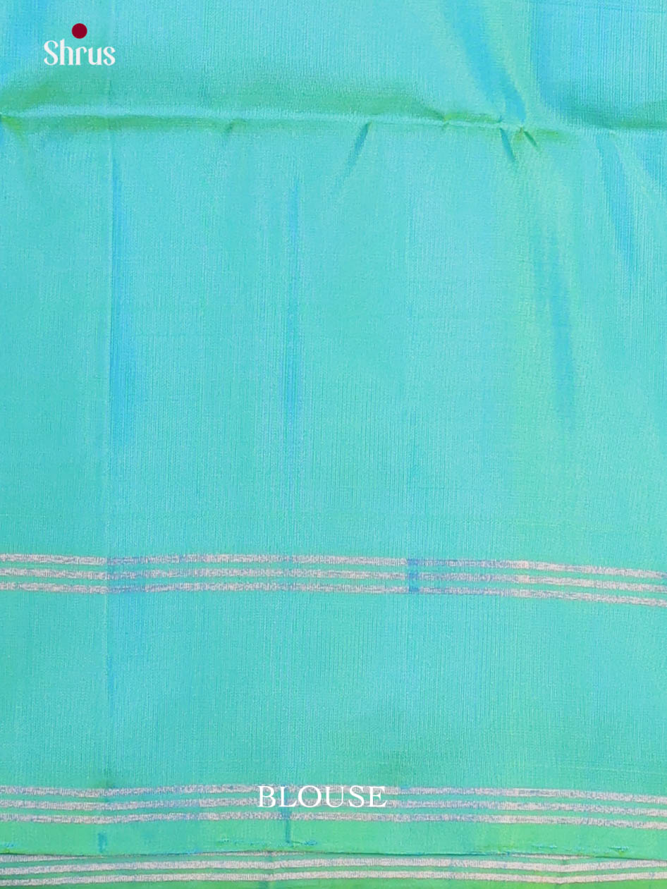 Enchanting Green single Tone Soft Silk Saree with zari buttas & rettaipet border