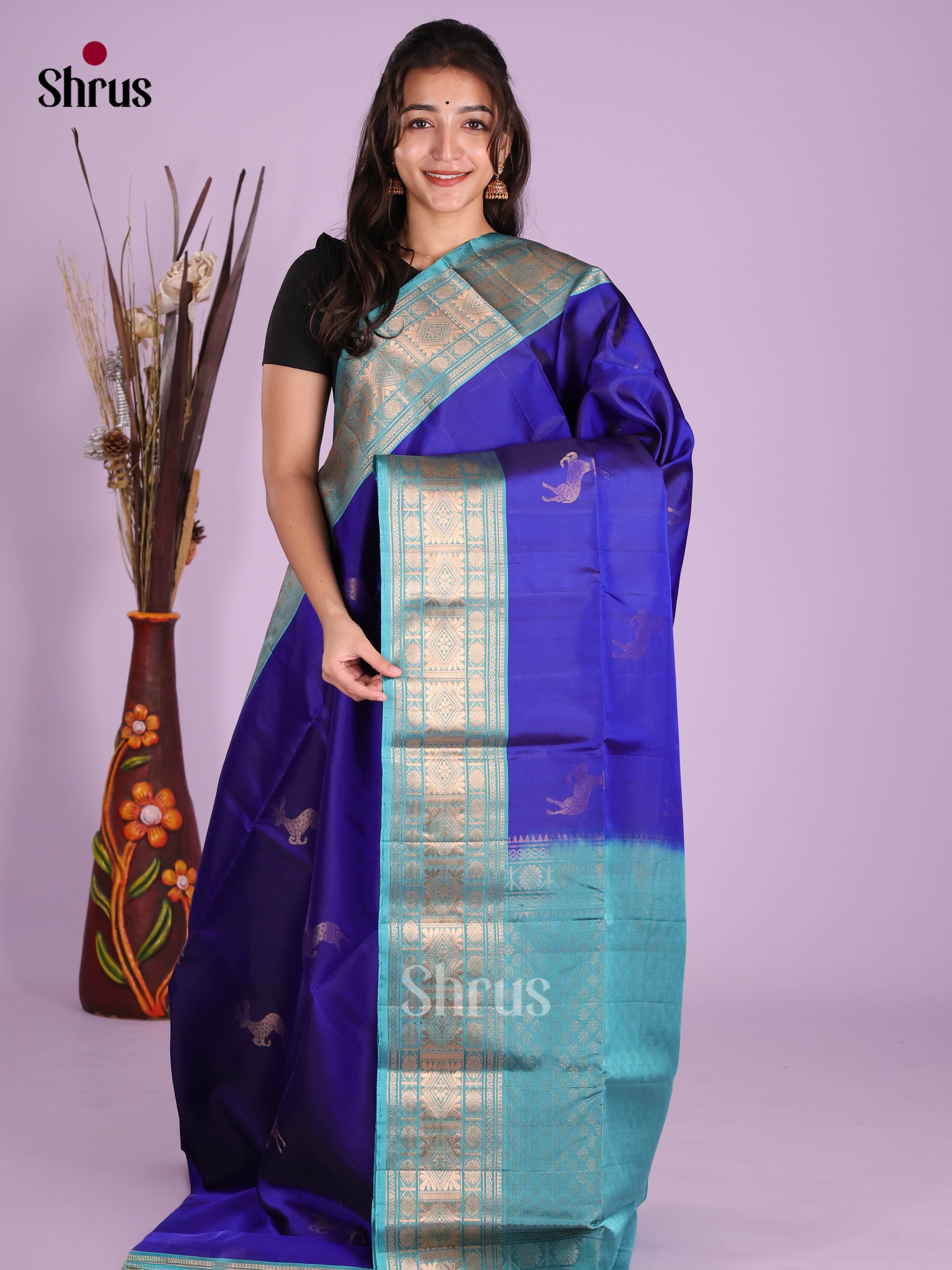 Royal Blue & Light Blue Soft Silk Saree gleams with gold zari deer motifs