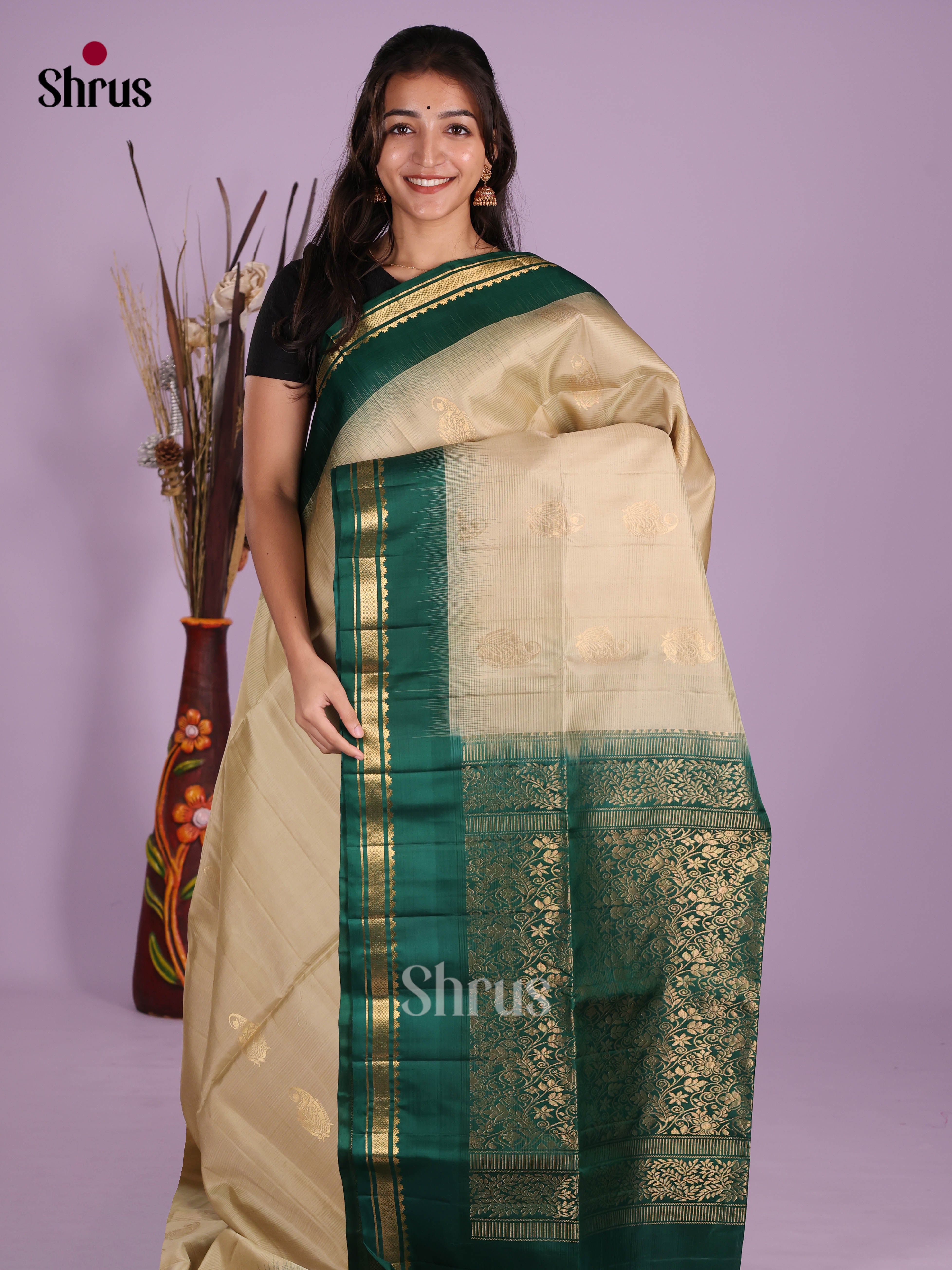 Stunning Cream Soft Silk Saree with gold zari butta & rich brocade pallu