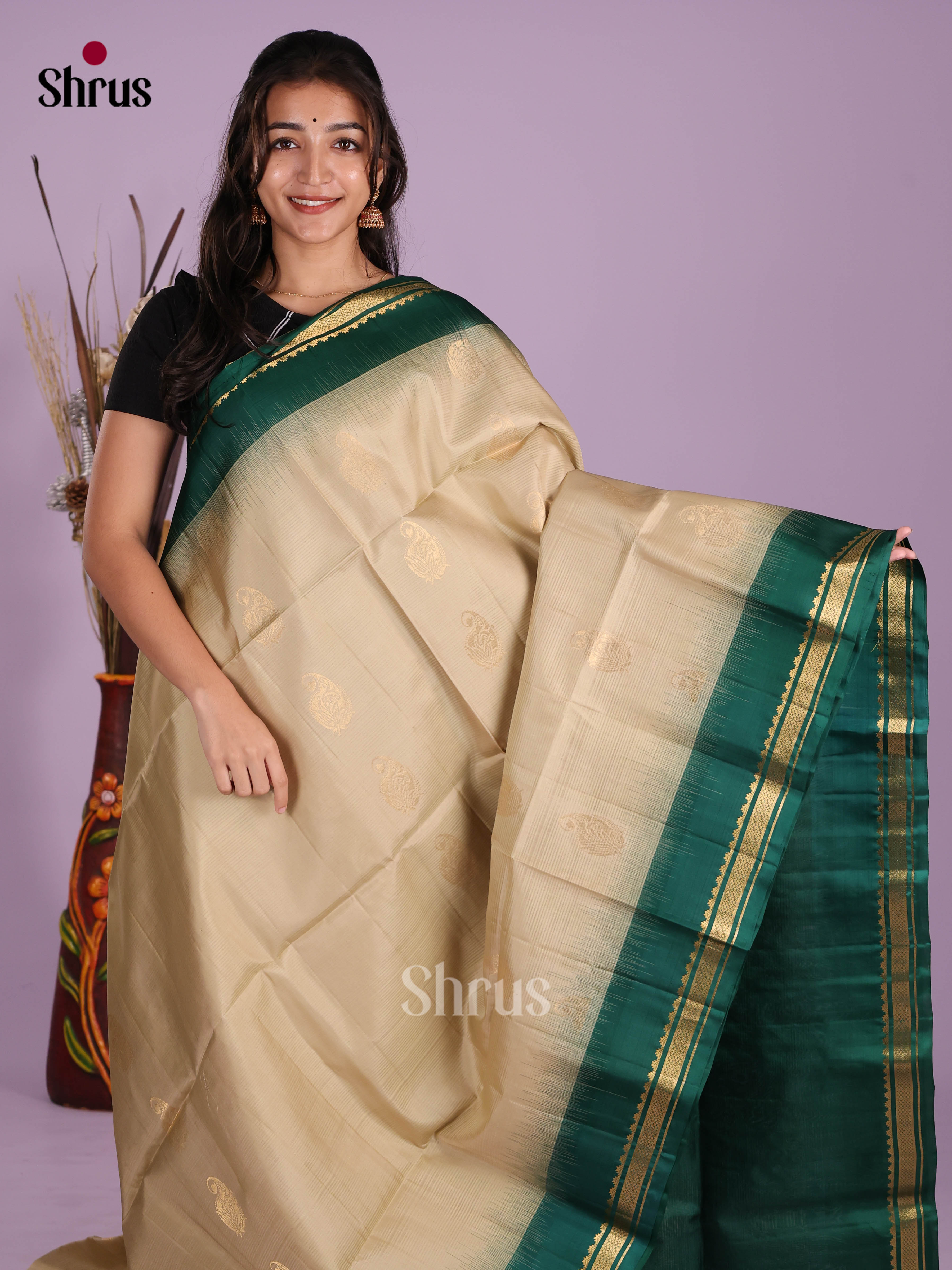 Stunning Cream Soft Silk Saree with gold zari butta & rich brocade pallu