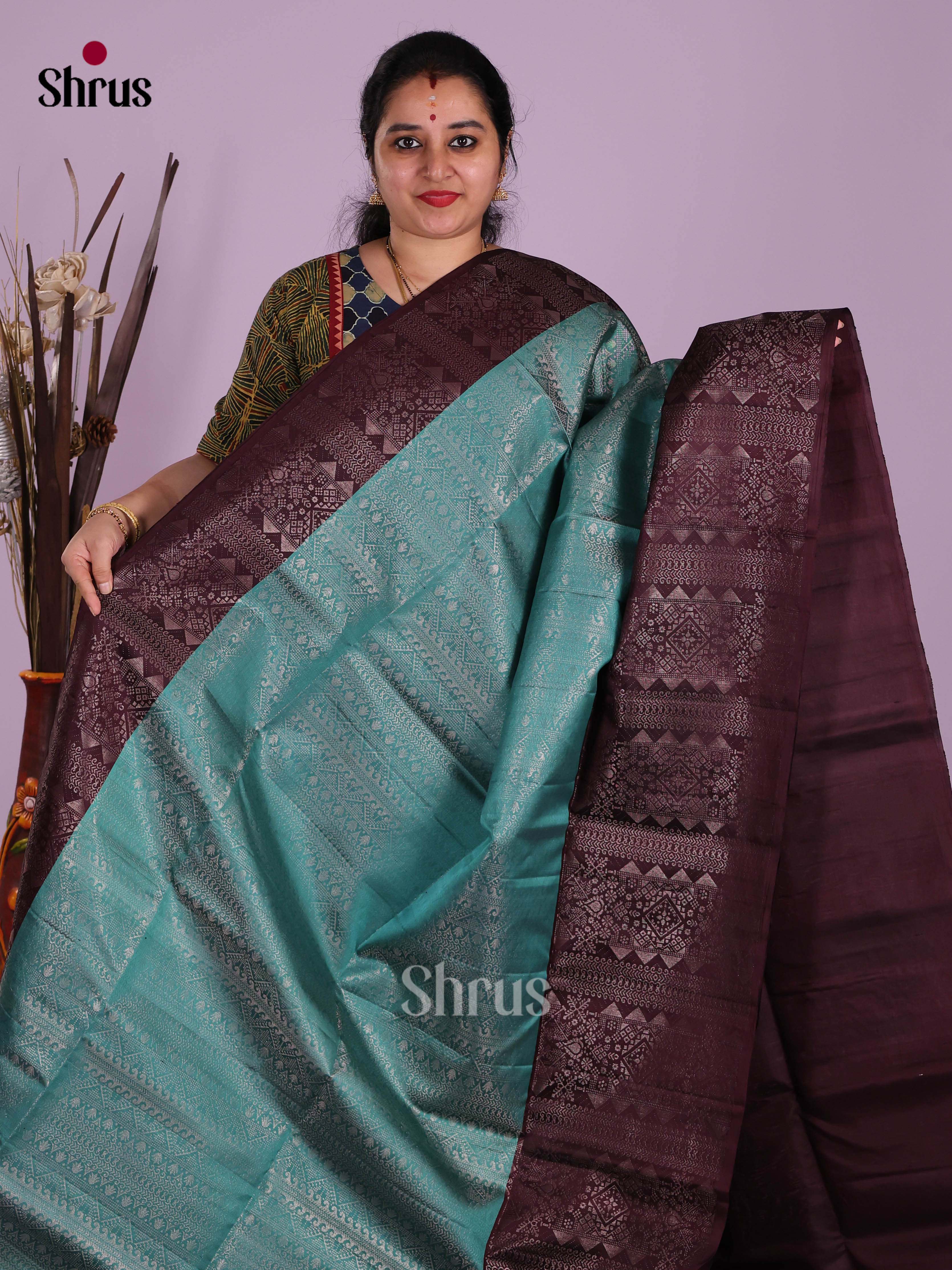 Regal Pastel Blue Soft Silk Saree with Zari Brocade Body & Broad Brown Border