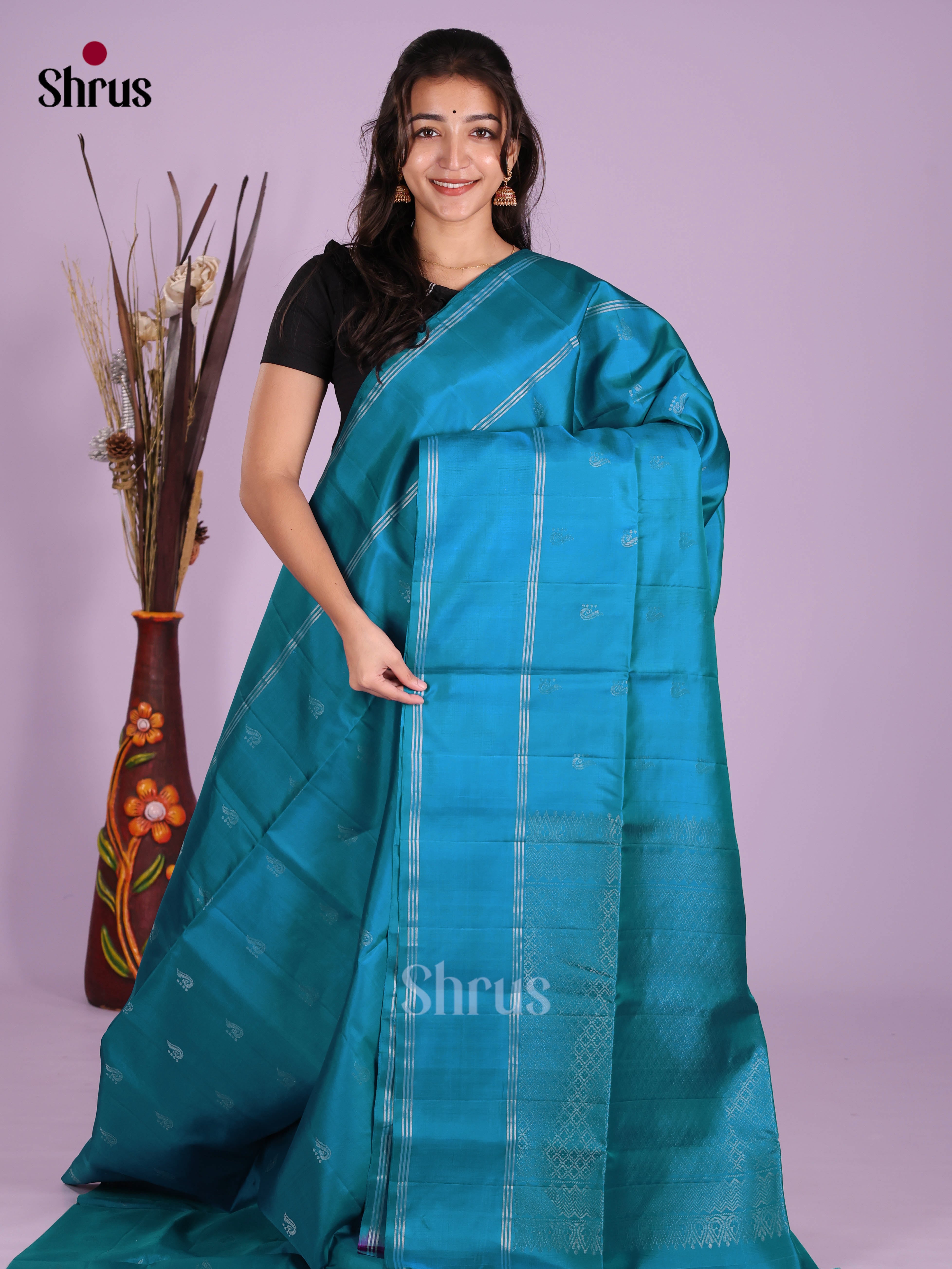 Vibrant Blue Soft Silk  Saree with zari buttas & rettaipet border