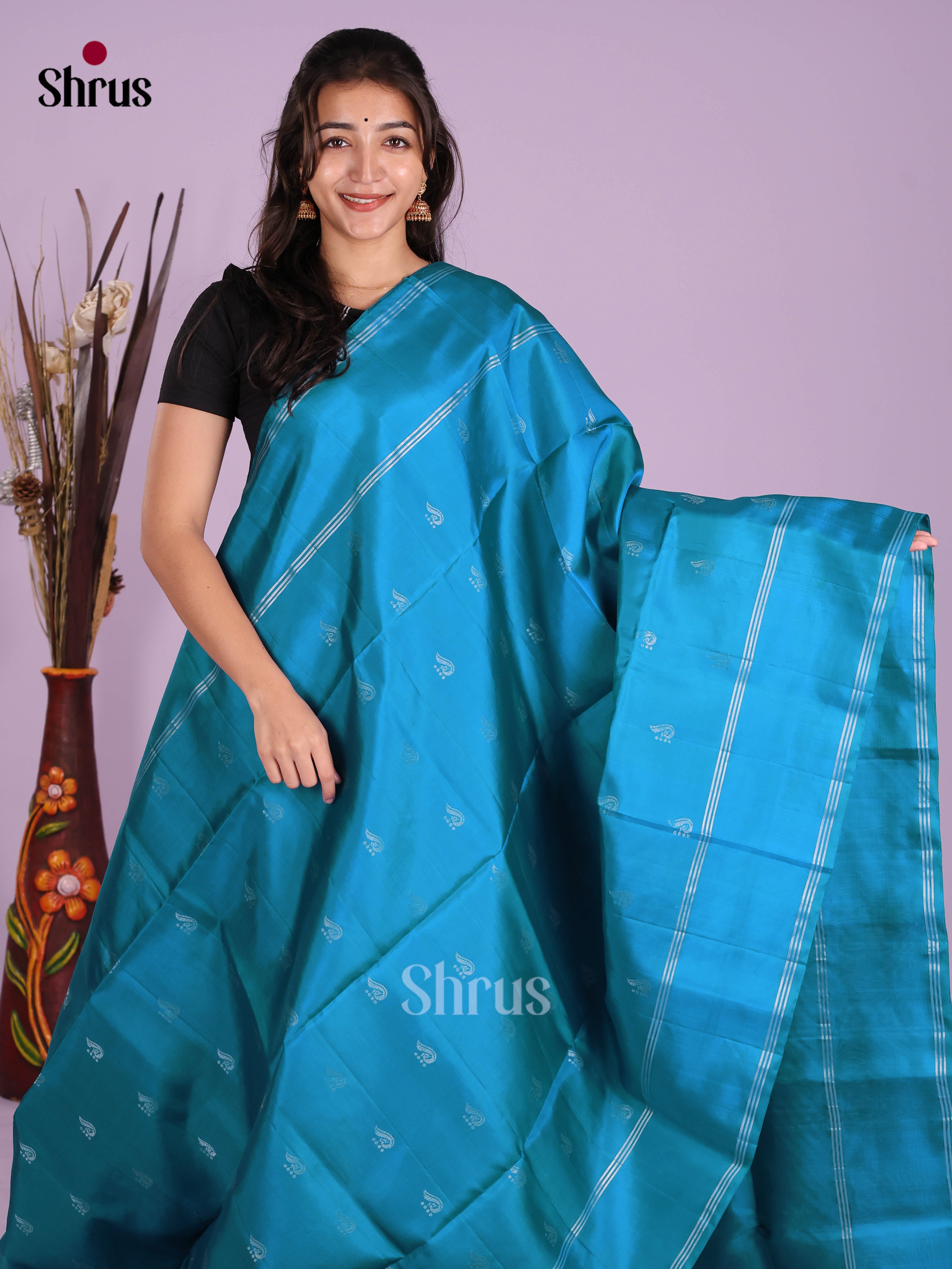 Vibrant Blue Soft Silk  Saree with zari buttas & rettaipet border
