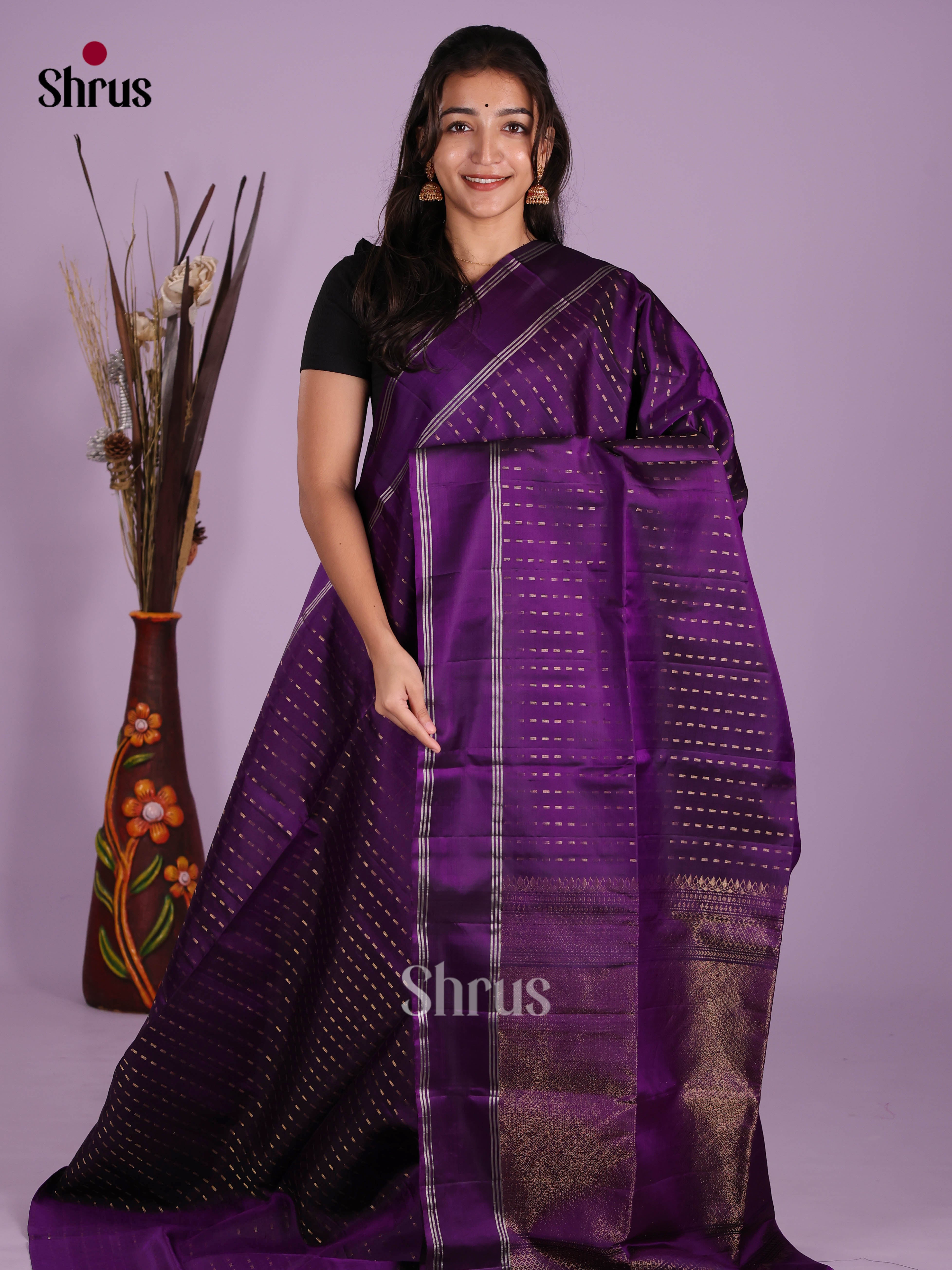 Dazzling Violet Soft Silk Saree gleams with zari stripes & brocade pallu