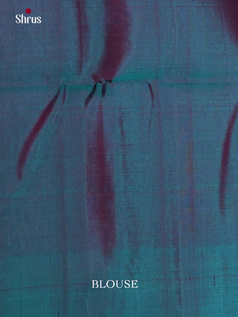 Charming Pink & Peacock Green Soft Silk Saree with zari woven floral nestling brocade