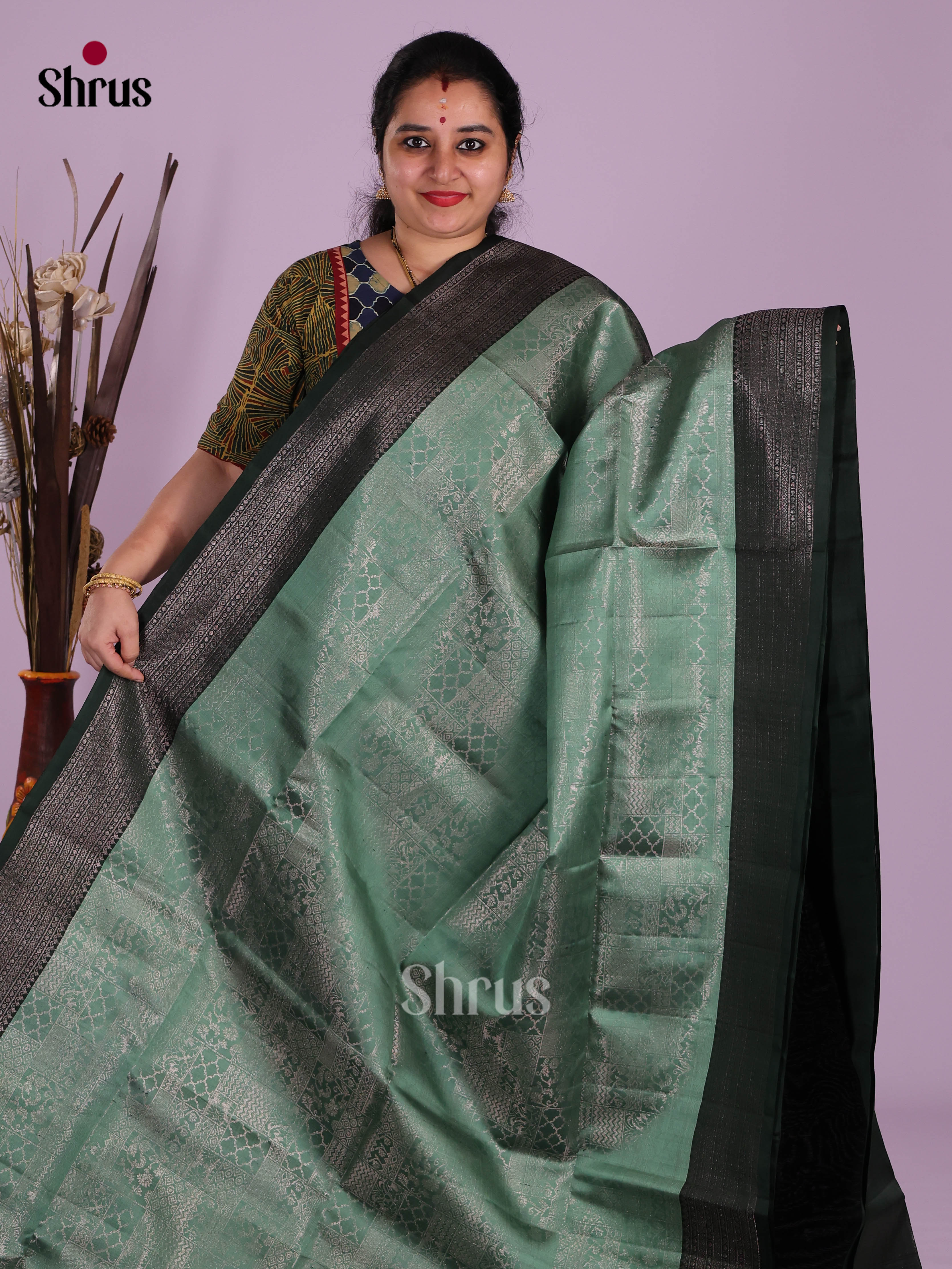 Pretty Aqua green Soft Silk Saree With Zari Floral Brocade & Dark Green border