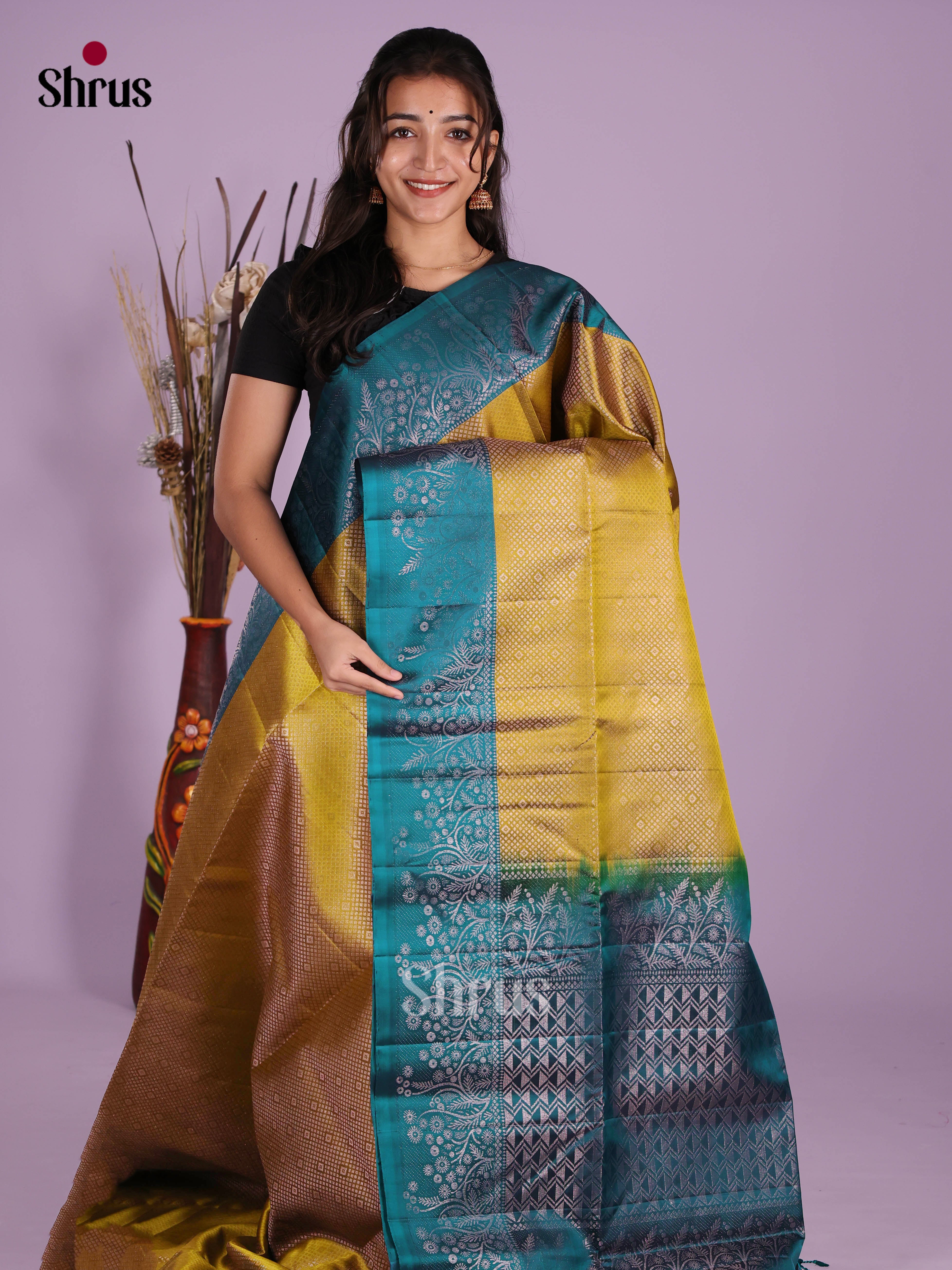 Lustrous Mustardy Green Soft Silk Saree with zari floral nestling brocade & rich pallu