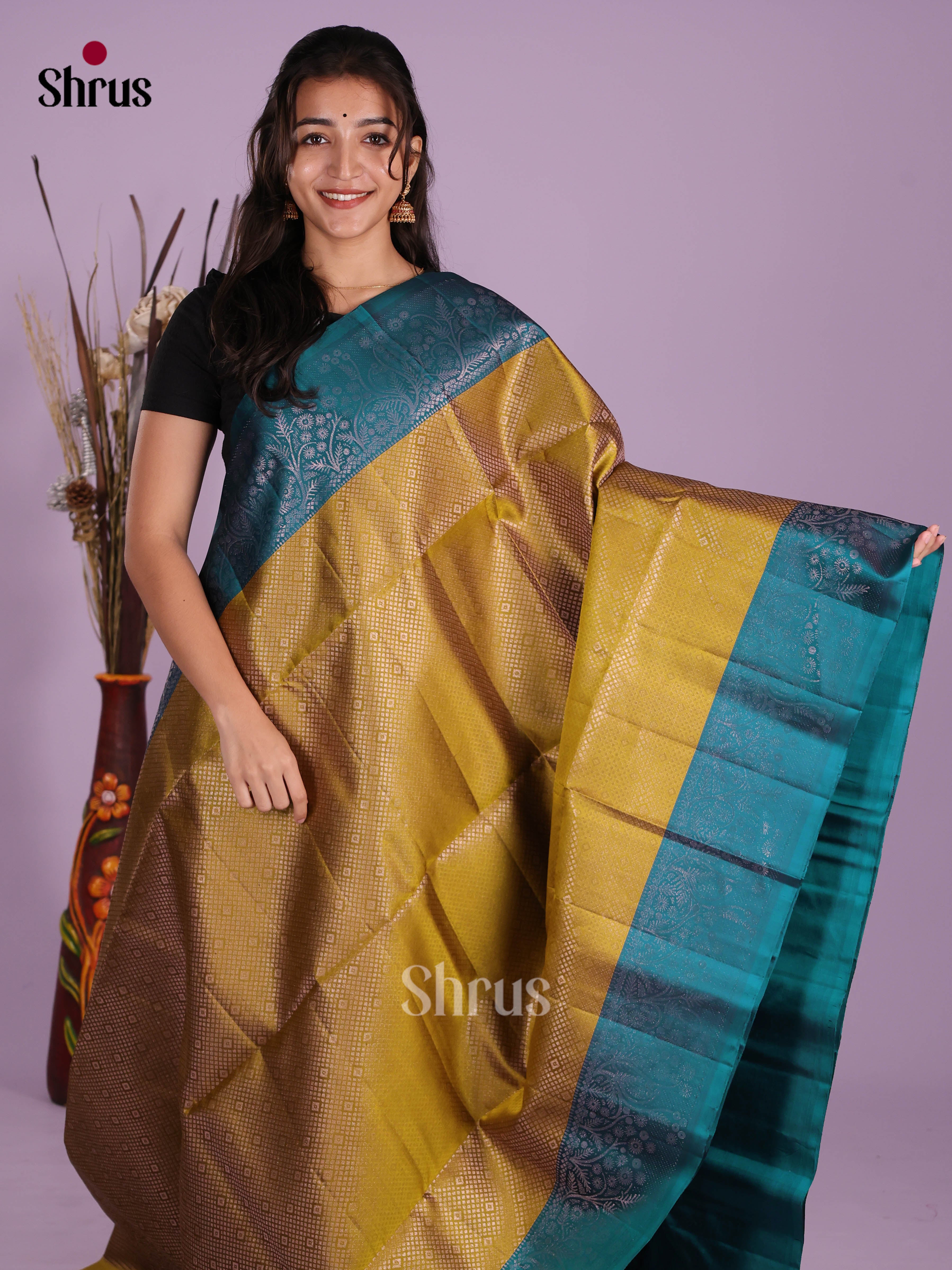 Lustrous Mustardy Green Soft Silk Saree with zari floral nestling brocade & rich pallu