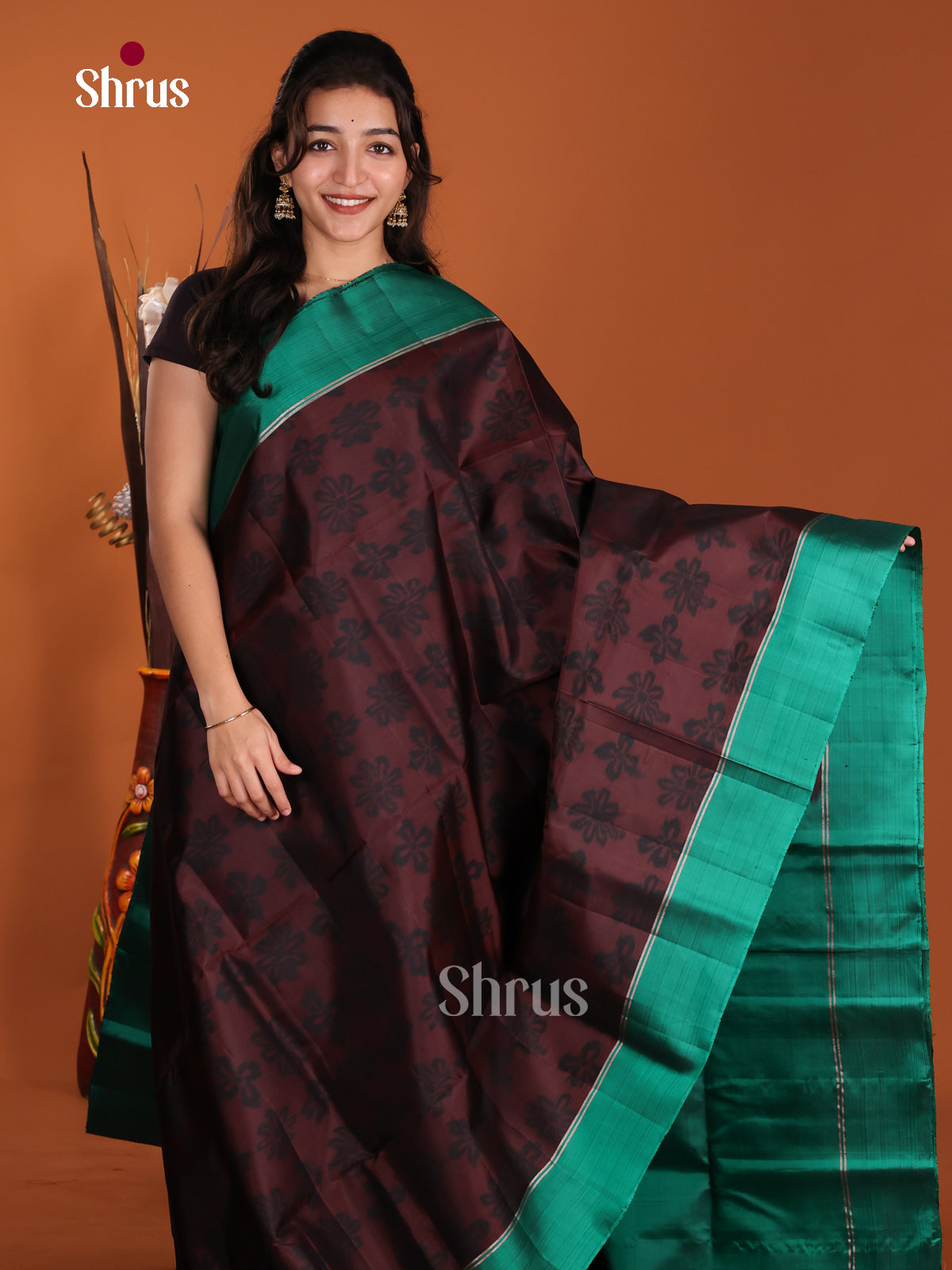 Stunning Brown & Green Soft Silk Saree with floral buttas & peacock motif pallu - Shop on Shrus.com