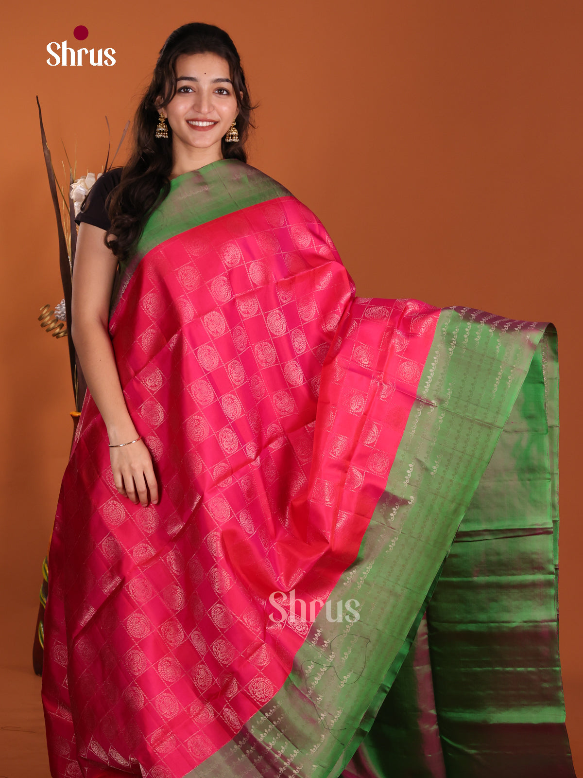 Charming Pink & Green Soft Silk Saree with zari Checks & peacock motifs