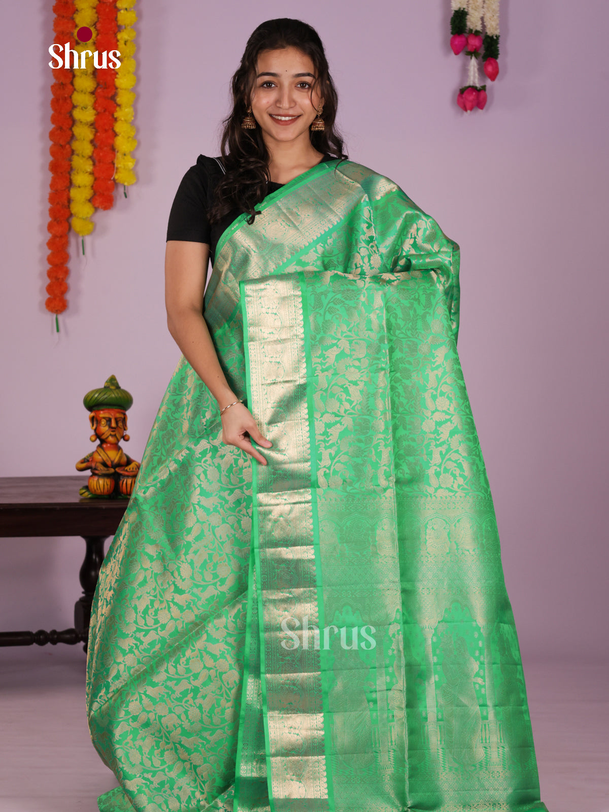 Chic & Elegant Green Soft Silk  Saree with vanashingaram zari brocade