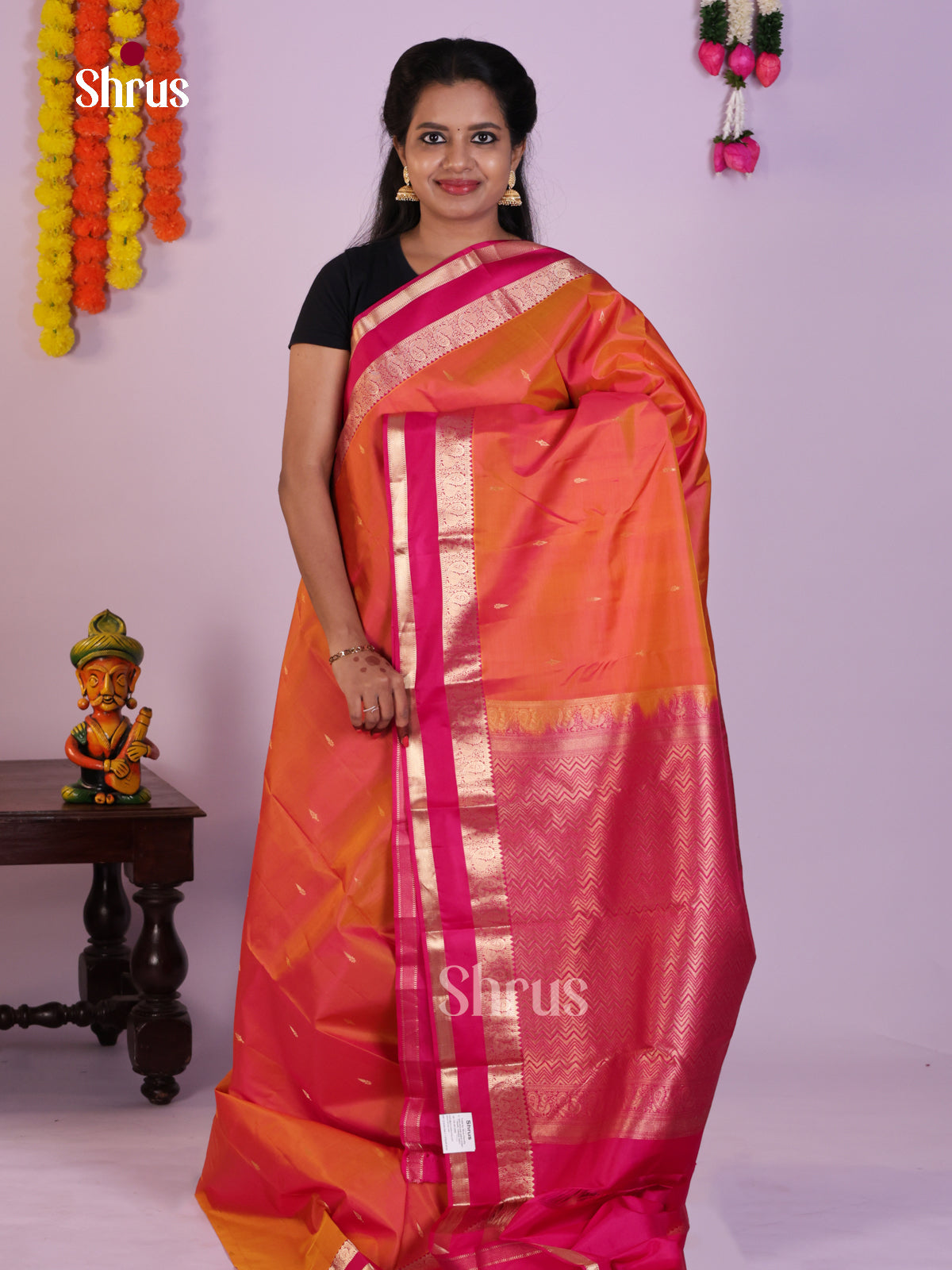 Timeless Orange Kanjivaram Saree With Golden Thilagam Buttas & Pink Rettaipet Border