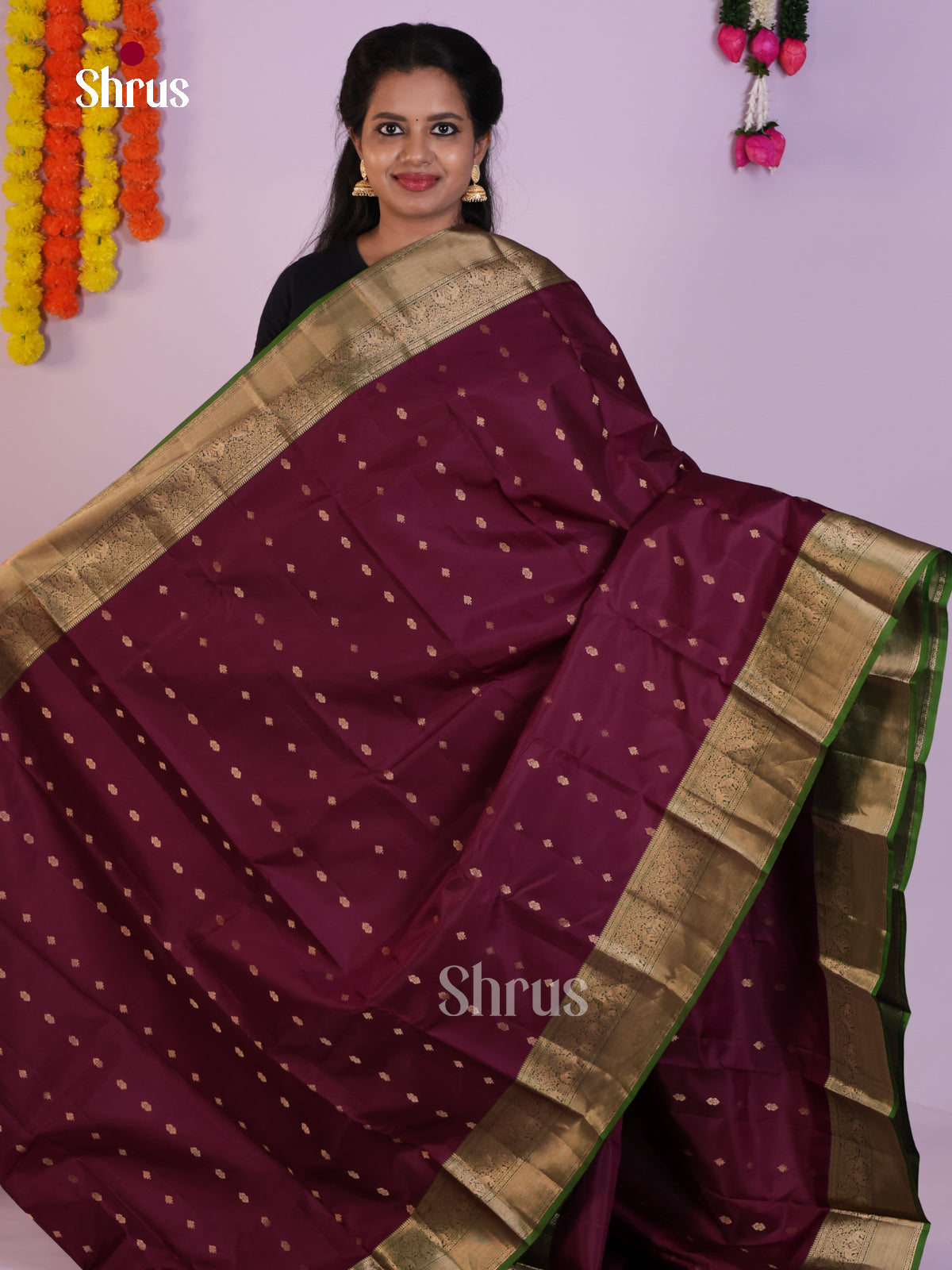 Classy Wine Kanchipuram Saree With Golden Buttas & Green Zari Border
