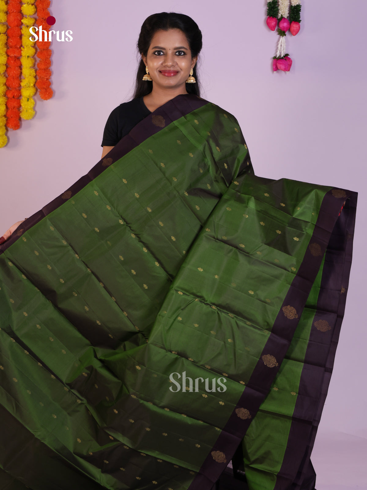 Regal Green Wedding Saree With Zari Woven Paisley Motifs In Purple Border